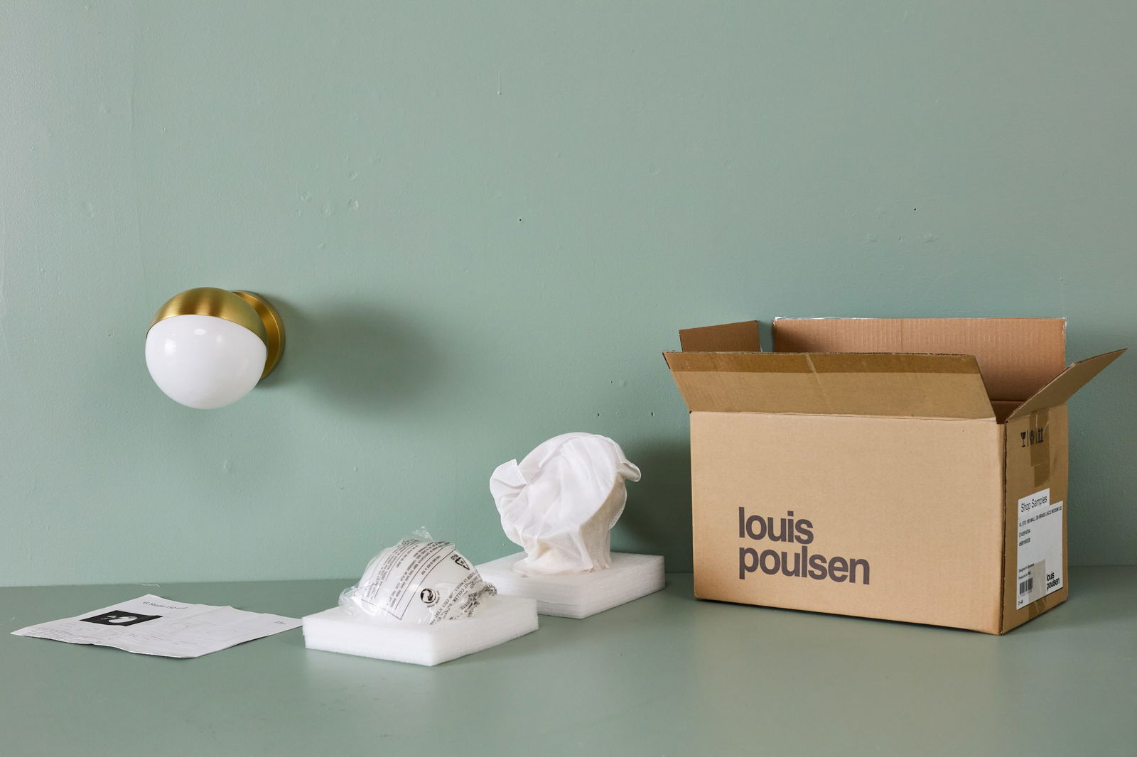 Vilhelm Lauritzen, 'VL Studio 150' Sconces (2): VILHELM LAURITZEN Pair of 'VL Studio 150' wall lamps, 2020s Brass, glass. Manufactured by Louis Poulsen, Denmark. Each: 6" H x 6" W x 8" D