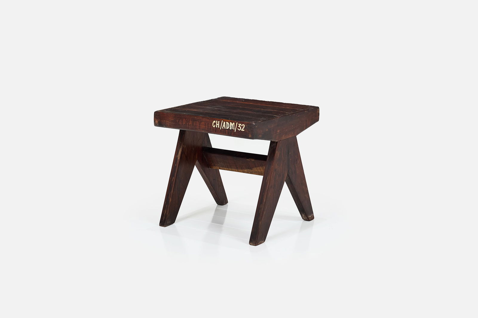 Pierre Jeanneret, Slatted StoolÂ : PIERRE JEANNERETSlatted stool, from Chandigarh, ca. 1960Teak. Produced in France / India for Punjab University, Chandigarh, India.Stencilled markings to the seat edge. 18" H x 18"