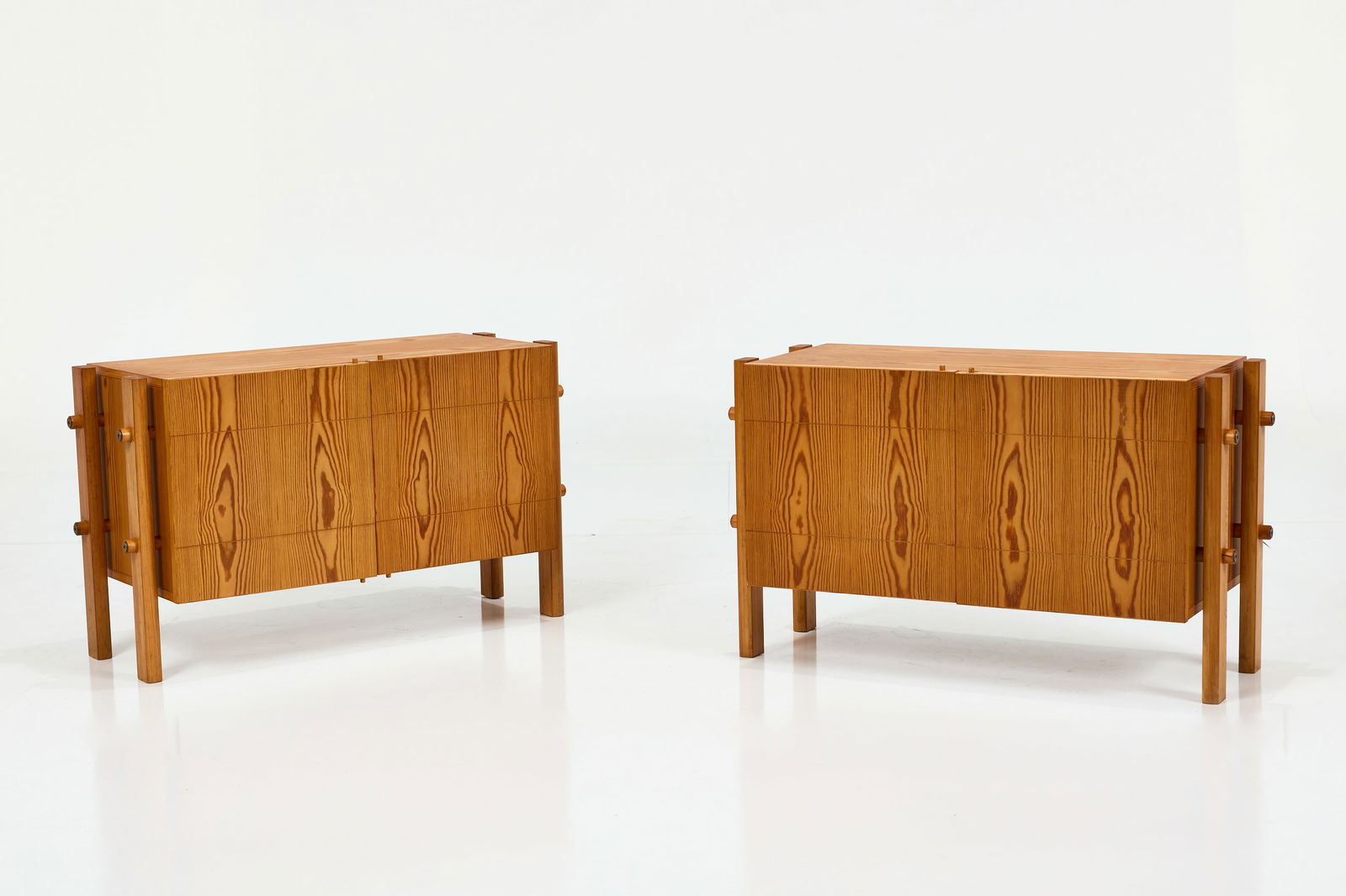 Poul Hundevad, Petite Cabinets (2): POUL HUNDEVAD Pair of petite cabinets, 1960s Pine, brass. Produced by Poul Hundevad, Denmark. Each: 21.5" H x 35" W x 14.25" D