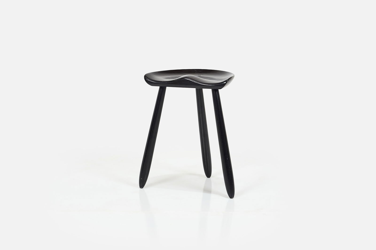 Arne Hovmand-Olsen, Stool: ARNE HOVMAND-OLSEN Three-leg stool, 1960s Ebonized wood. Made in Denmark. 19.5" H x 15" W x 13" D