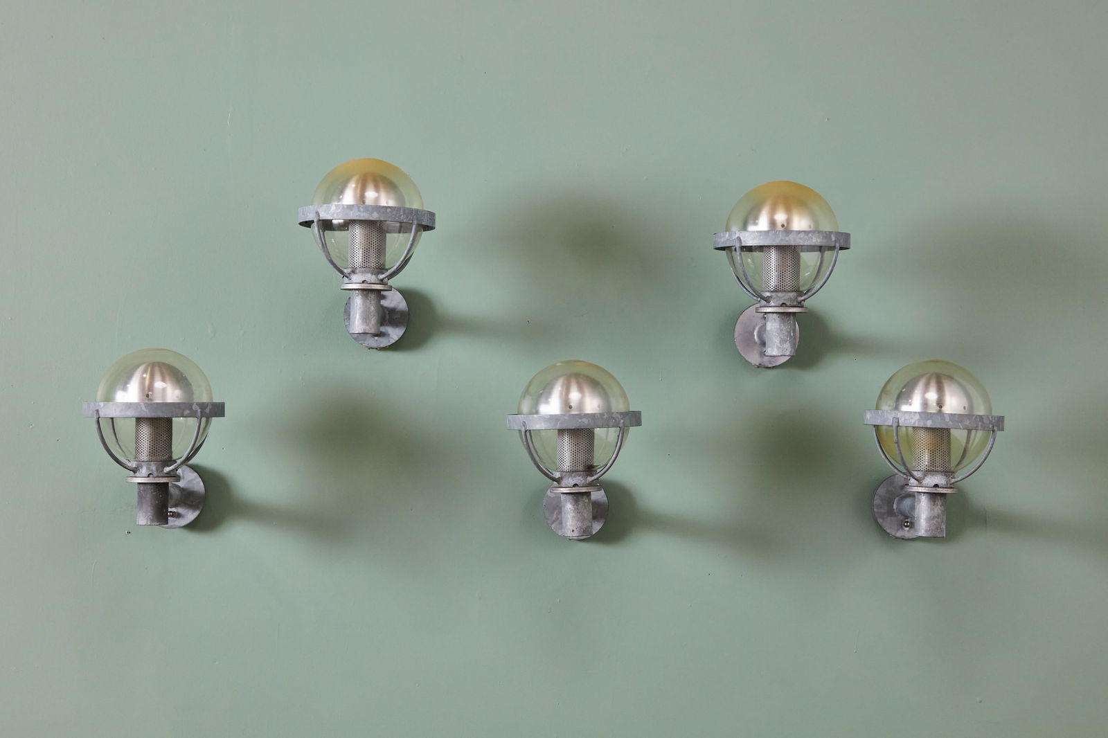 Louis Poulsen, Outdoor Sconces (5): LOUIS POULSEN Set of five outdoor sconces, model no. SEL 30, ca. 1965 Galvanized steel, aluminum, rubber, acrylic. Manufactured by Louis Poulsen, Denmark. Each: 13" H x 10" W x