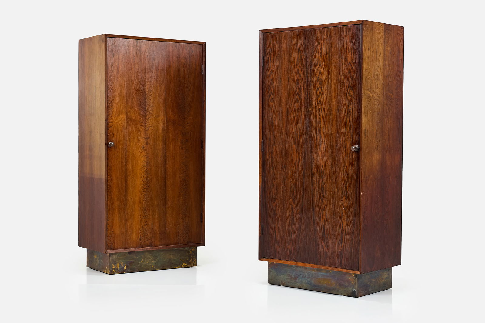 Danish, Standing Cabinets (2): DANISH Pair of standing cabinets, 1960s Rosewood, mahogany, brass. Each: 65.5" H x 31.5" W x 18.5" D