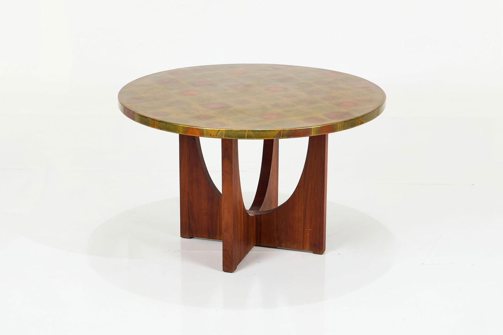 Modern, Dining Table: MODERNDining table, 1970sWalnut, gilt wood. 30" H x 48" Diameter