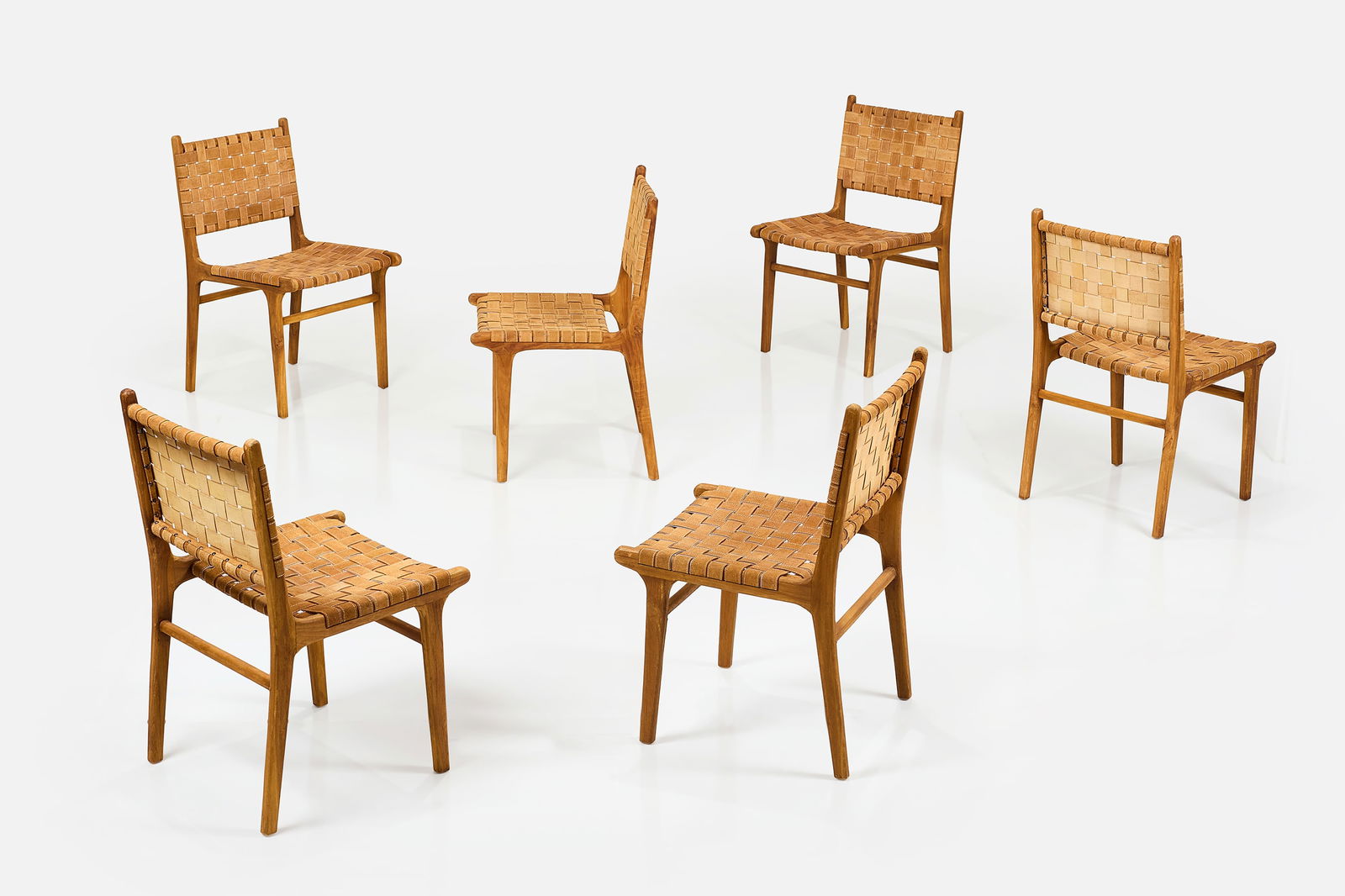 Adrianna Shamaris, Dining Chairs (6): ADRIANNA SHAMARIS Set of six dining chairs, 21st century Teak, enforced suede webbing. Manufactured by Adrianna Shamaris, USA. Each: 35" H x 20" W x 21.5" D Seat height: 19"