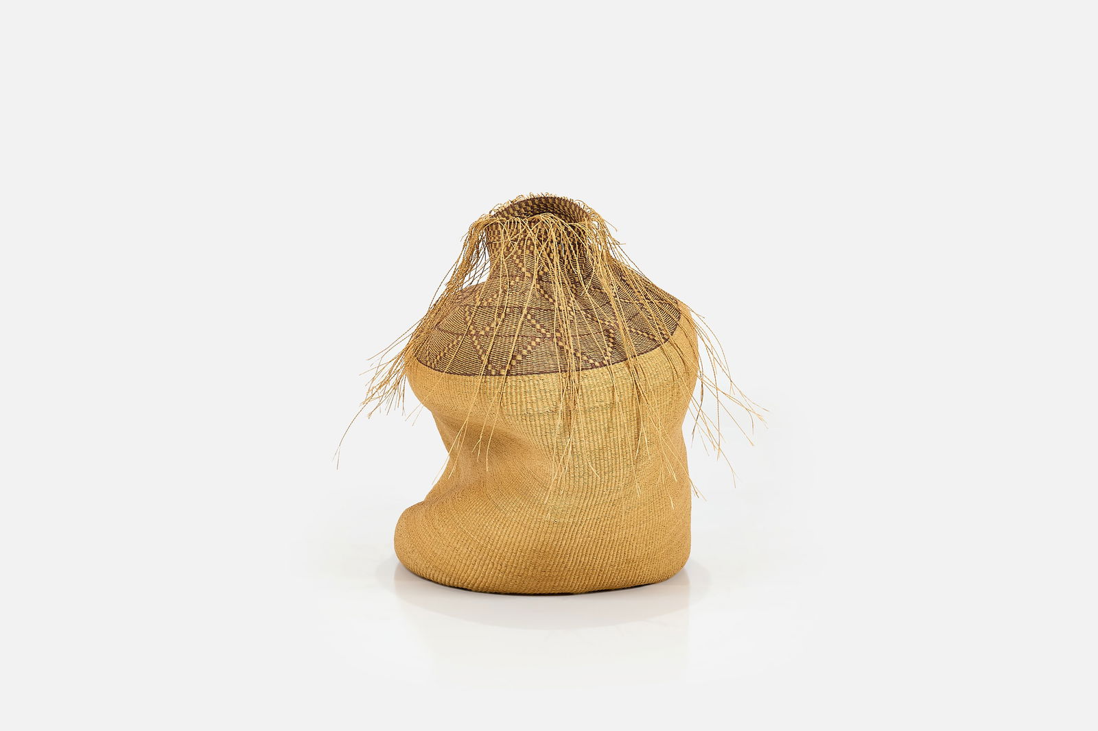 Bolgatanga, Large Basket: BOLGATANGA Large basket, 21st century Hand-woven grass straw. Produced in Bolgatanga, Ghana. 39" H x 30" Diameter