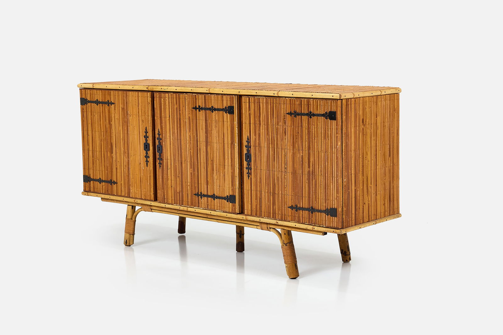 Adrien Audoux + Freda Minet (Attrib.), Sideboard: ADRIEN AUDOUX + FREDA MINET (Attrib.) Sideboard, 1950s Rattan, wood, iron. Produced in France. 33" H x 67.5" W x 18.5" D