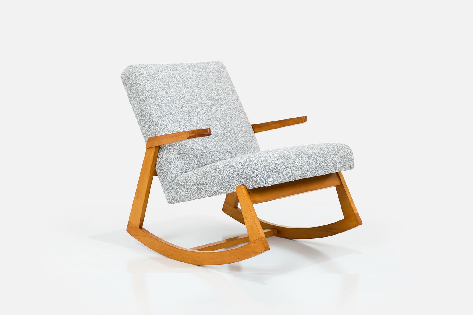 Ralph Rapson, Early Rocking Chair: RALPH RAPSONEarly rocking chair, 1940sBeech, upholstery. Produced by Knoll Associates, USA 32" H x 29" W x 35" D