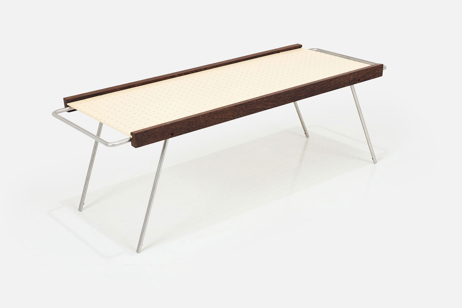 William 'Bill' Lam, 'Camel' Convertible Table: WILLIAM 'BILL' LAM Convertible 'Camel' coffee table, 1950s / 2000s Afromosia, Masonite, aluminum. Produced by California Living, USA. 15.5" - 8.25" H x 44.25"