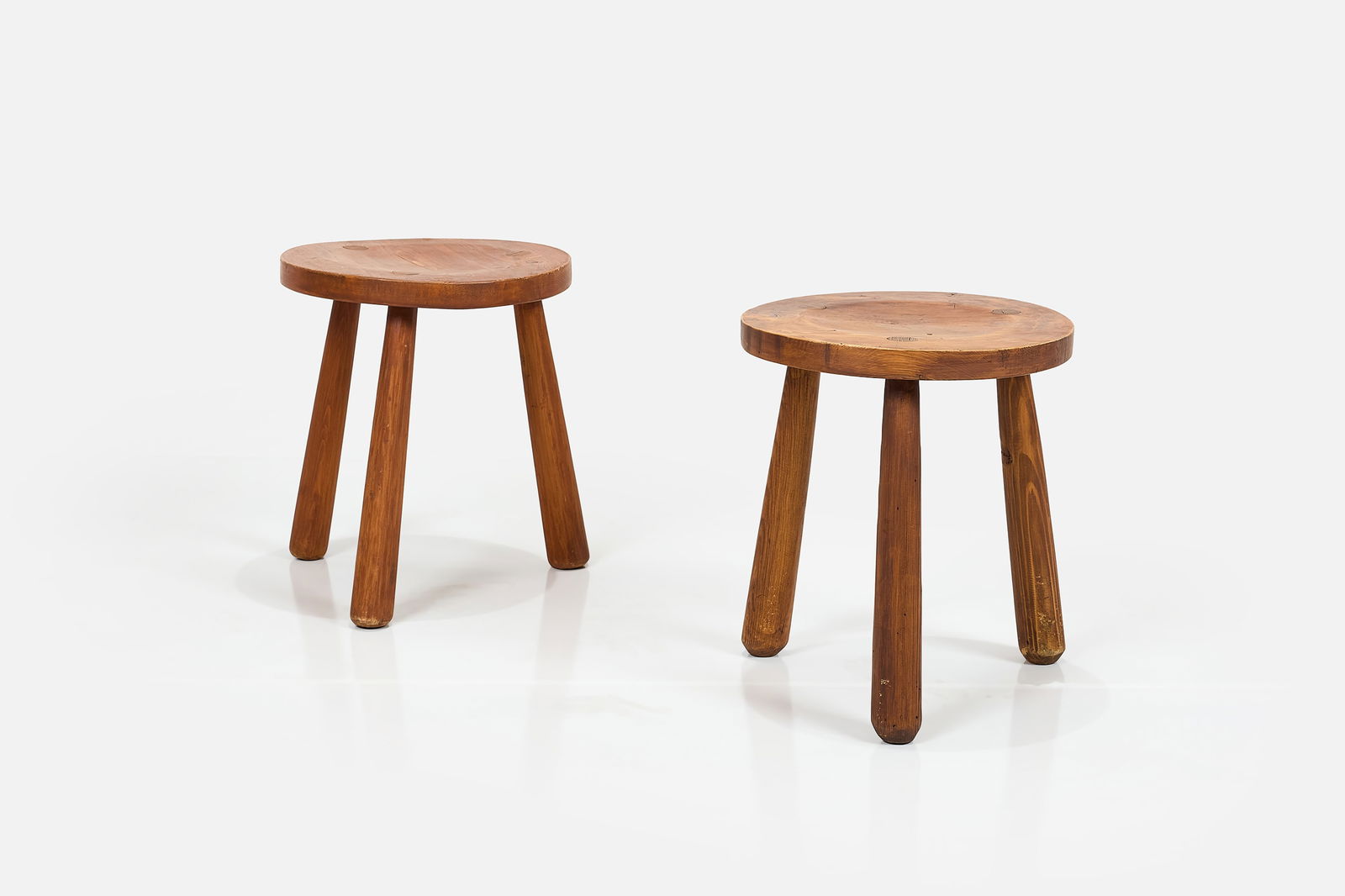Axel Einar Hjorth, 'Uto' Stools (2): AXEL EINAR HJORTHPair of 'Uto' stools, 1930sPine. Produced by Nordiska Kompaniet, Sweden. Each: 18" H x 15.75" Diameter