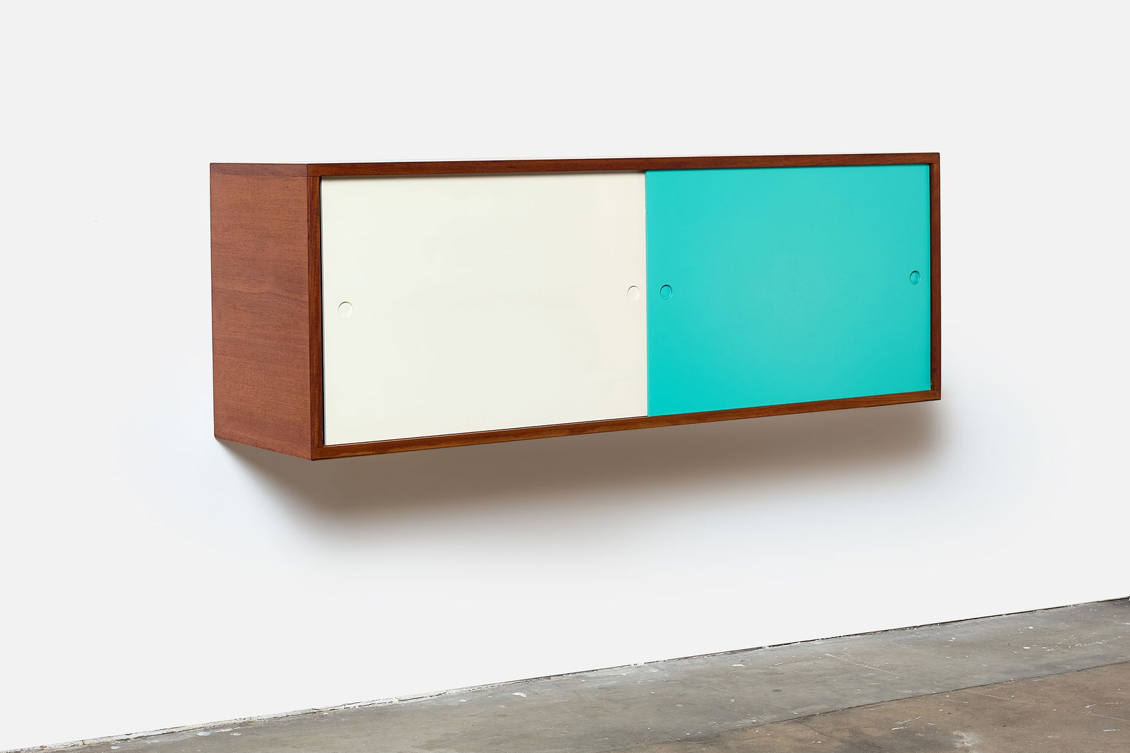 Heinrich Roepstorff, Small Wall-Mount Cabinet: HEINRICH ROEPSTORFF Small wall-mount cabinet, ca. 1955 Teak, lacquered wood. Produced by Heinrich Roepstorff, Denmark. Back with manufacturer's label. 18" H x 50.5" W x