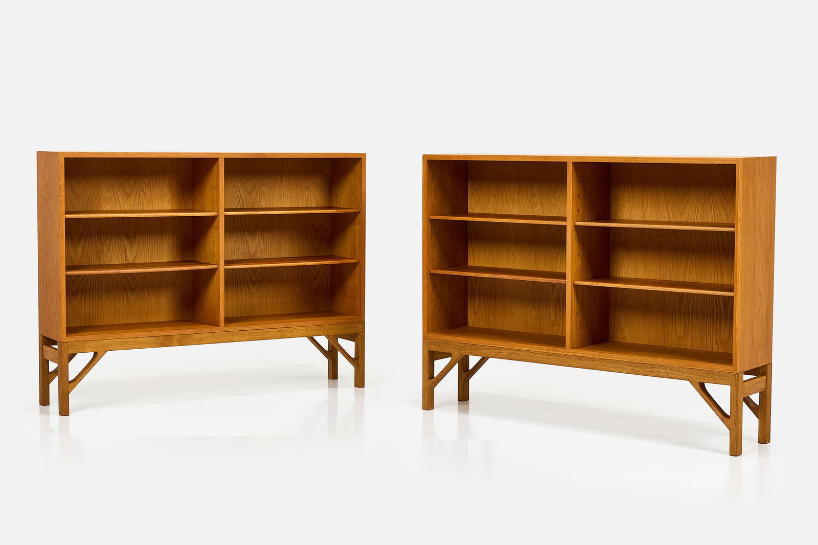 Borge Mogensen, Bookcases (2): BORGE MOGENSENPair of bookshelves, 1960sOak, teak. Produced by FDB Mobler, Denmark. Each: 36.25" H x 48" W x 14.25" D