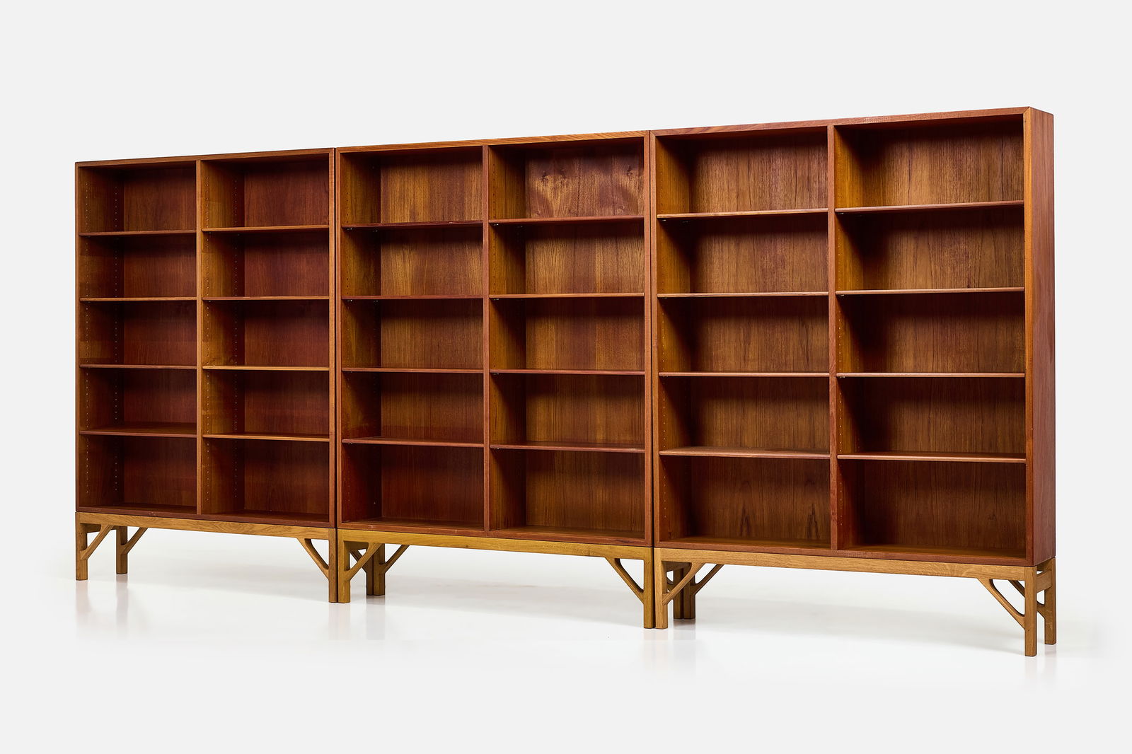 Borge Mogensen, Large Bookcases (3): BORGE MOGENSENSet of three large bookcases, 1960sOak, teak. Produced by FDB Mobler, Denmark.Each with manufacturer's stamp to the back. Each: 62.75" H x 48" W x 10.25" D