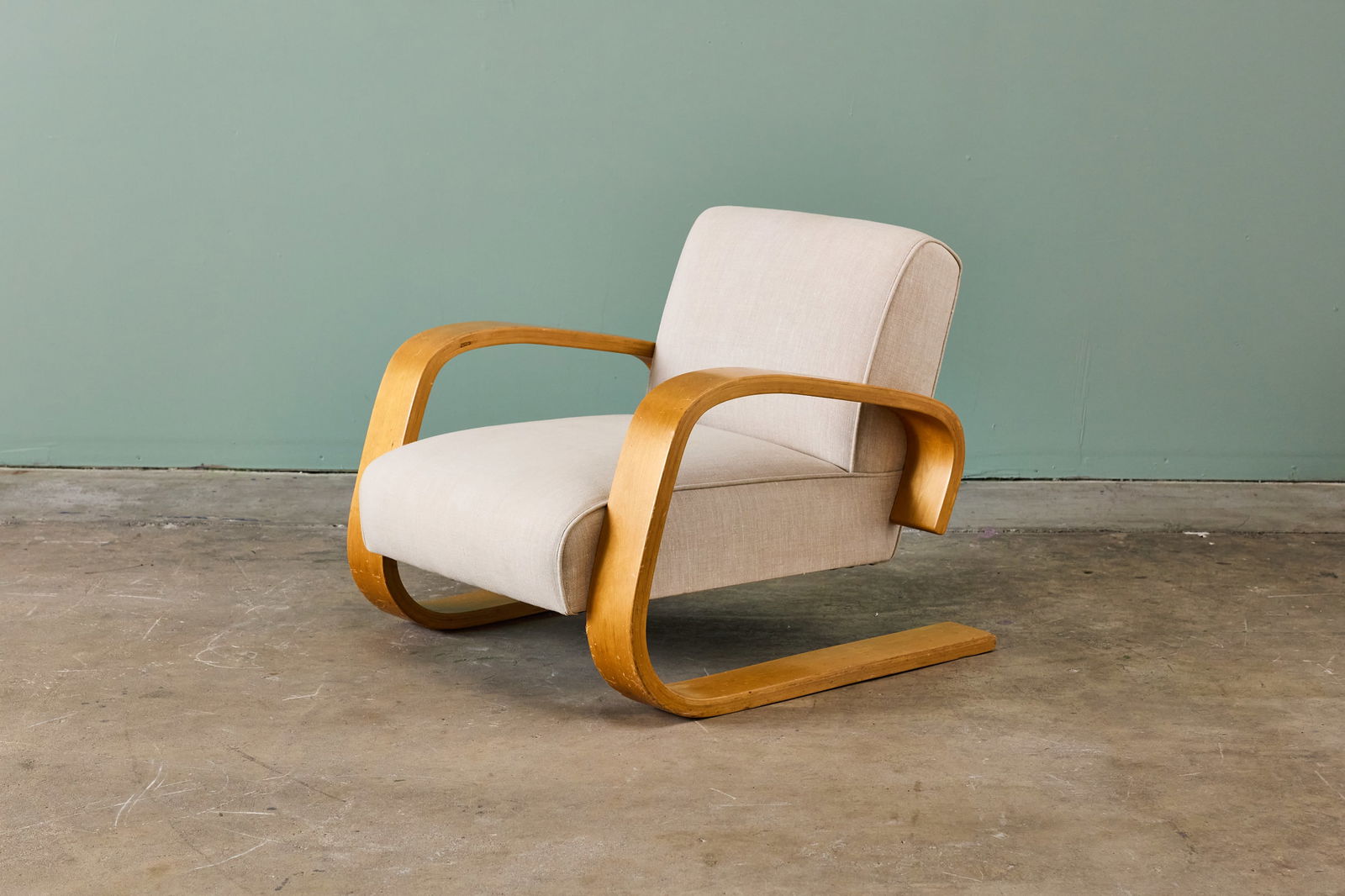 Alvar Aalto, 'Tank' Chair: ALVAR AALTO'Tank' lounge chair, 1970sBirch plywood, fabric. Manufactured by Artek, Finland. 27.5" H x 29.75" W x 35" DSeat height: 16" 