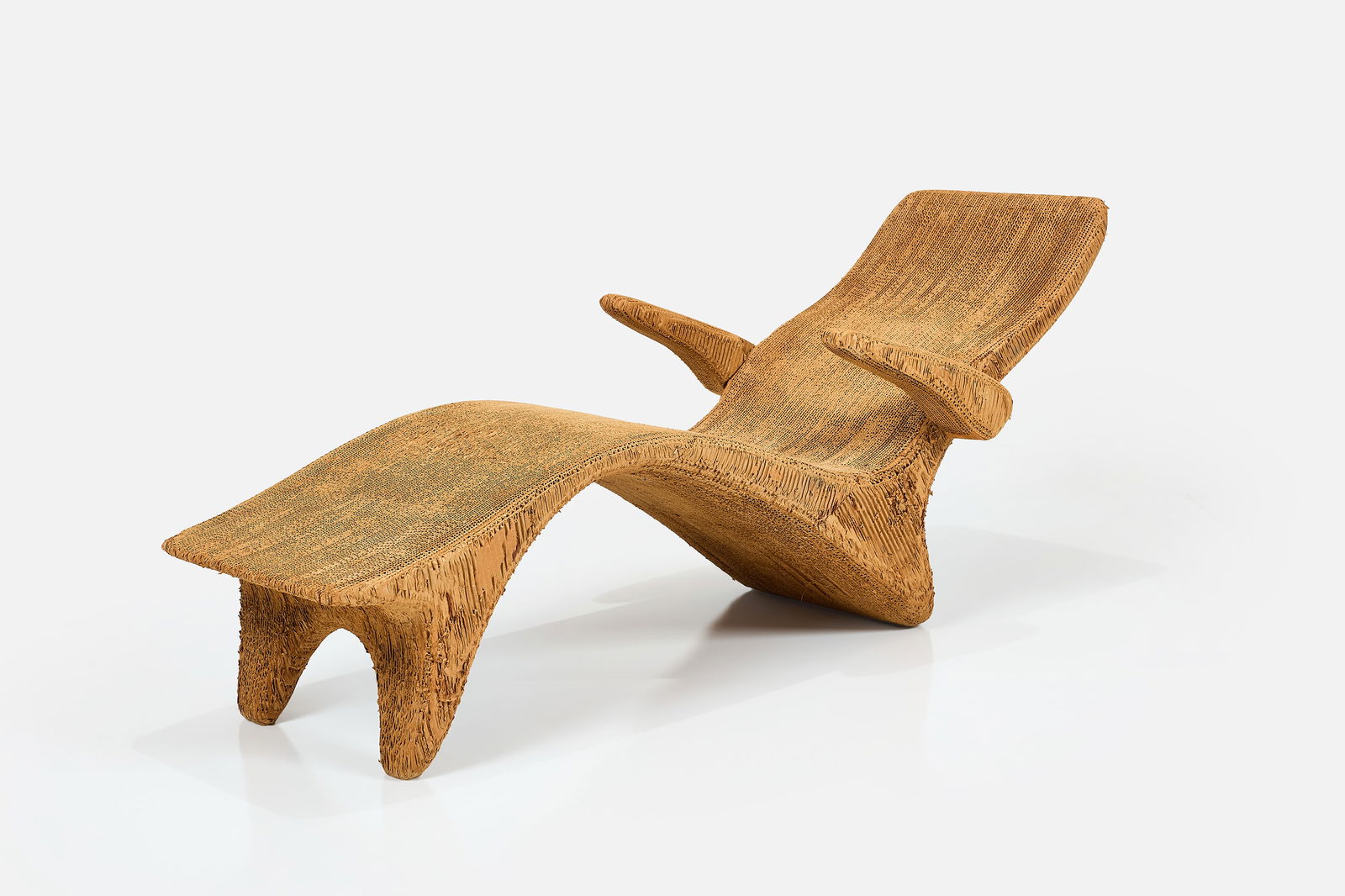Joel Stearns, Cardboard Chaise Lounge: JOEL STEARNSChaise lounge, 1970sCorrugated cardboard. 27" H x 26" W x 64" D