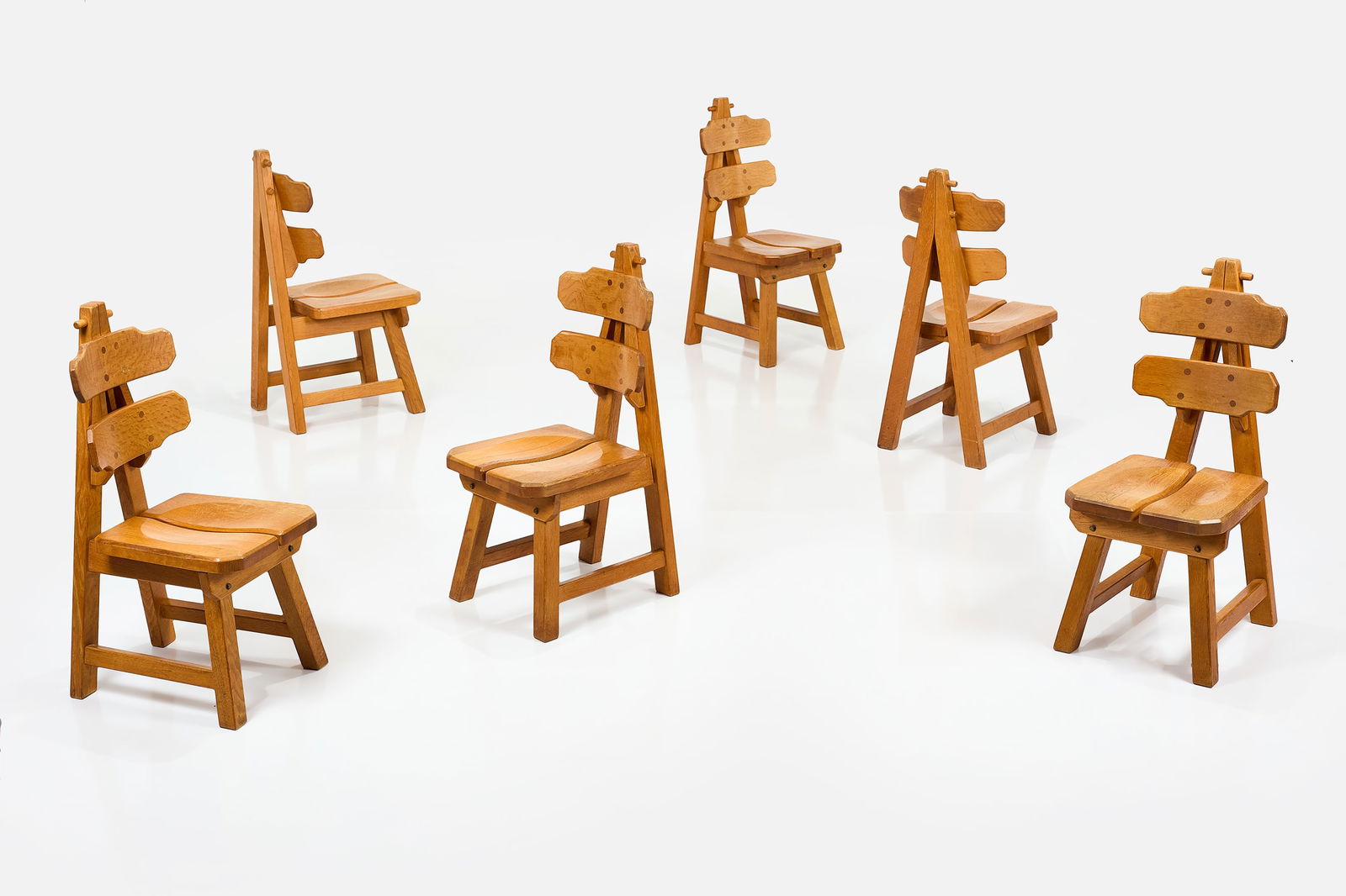 Spanish, Dining Chairs (6): SPANISH Set of six dining chairs, 1970s Oak. Each: 40.5" H x 17.25" W x 24" D Seat height: 18"
