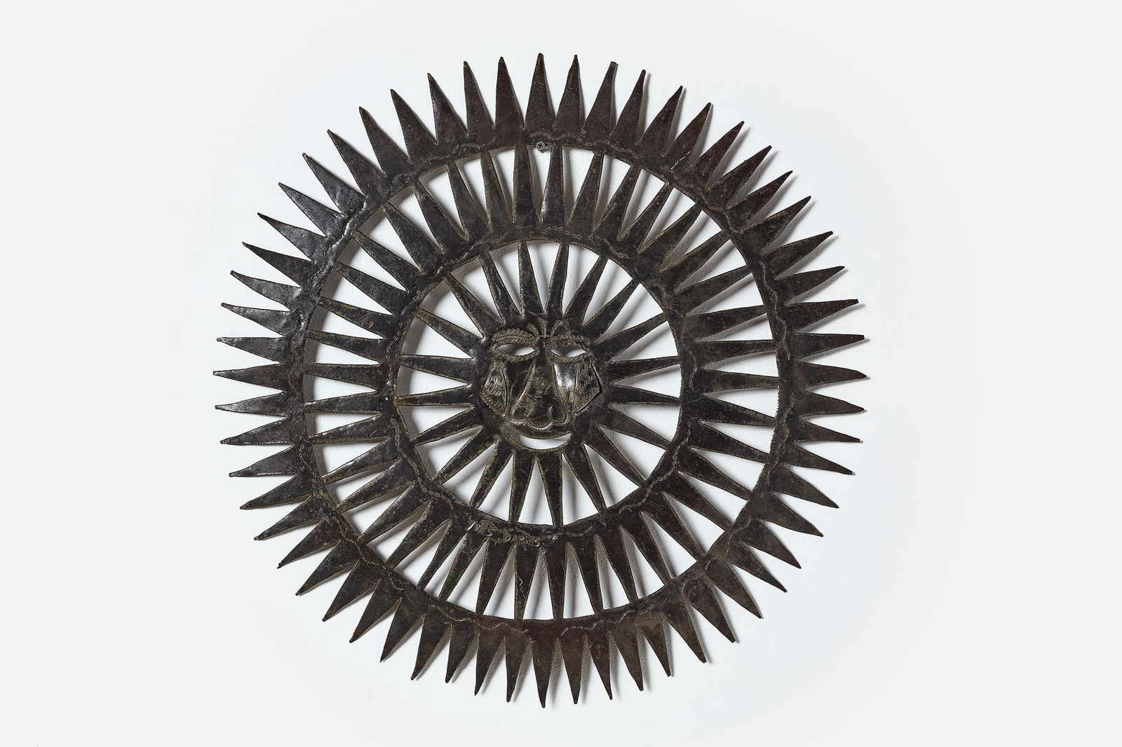 Yves Darius, Sun Wall Sculpture: YVES DARIUS Sun wall sculpture, 1980s Steel. Studio-made, Haiti. 24" Diameter