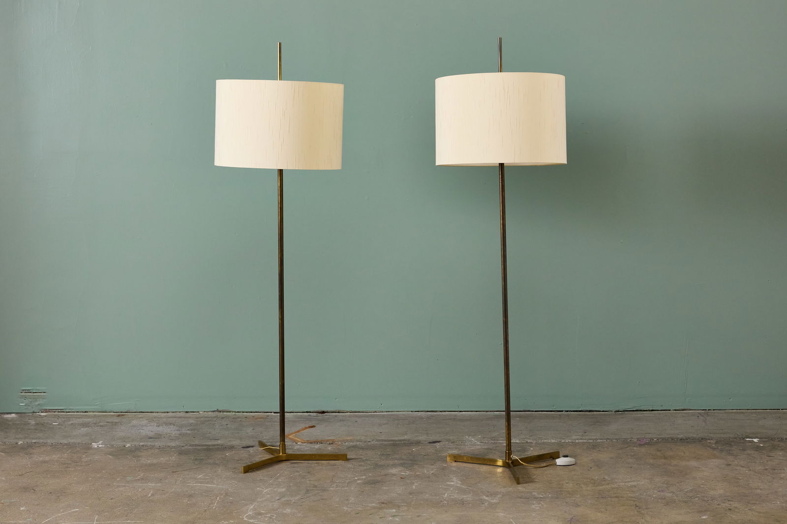 Svend Aage Holm-Sorensen, Floor Lamps (2): SVEND AAGE HOLM-SORENSEN Pair of floor lamps, 1950s Brass. Produced in Denmark. Each: 60" H x 16" Diameter
