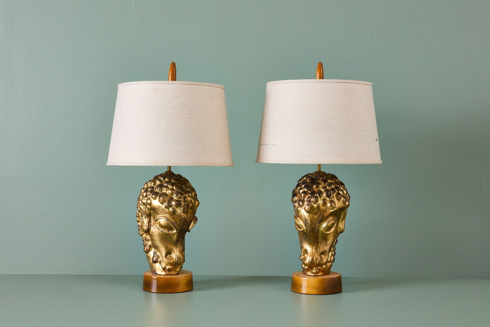 French, Ram's Head Table Lamps (2): FRENCH Pair of ram's head table lamps, 1950s Gilt wood, wood, brass. Each: 33" H x 10" W x 8" D