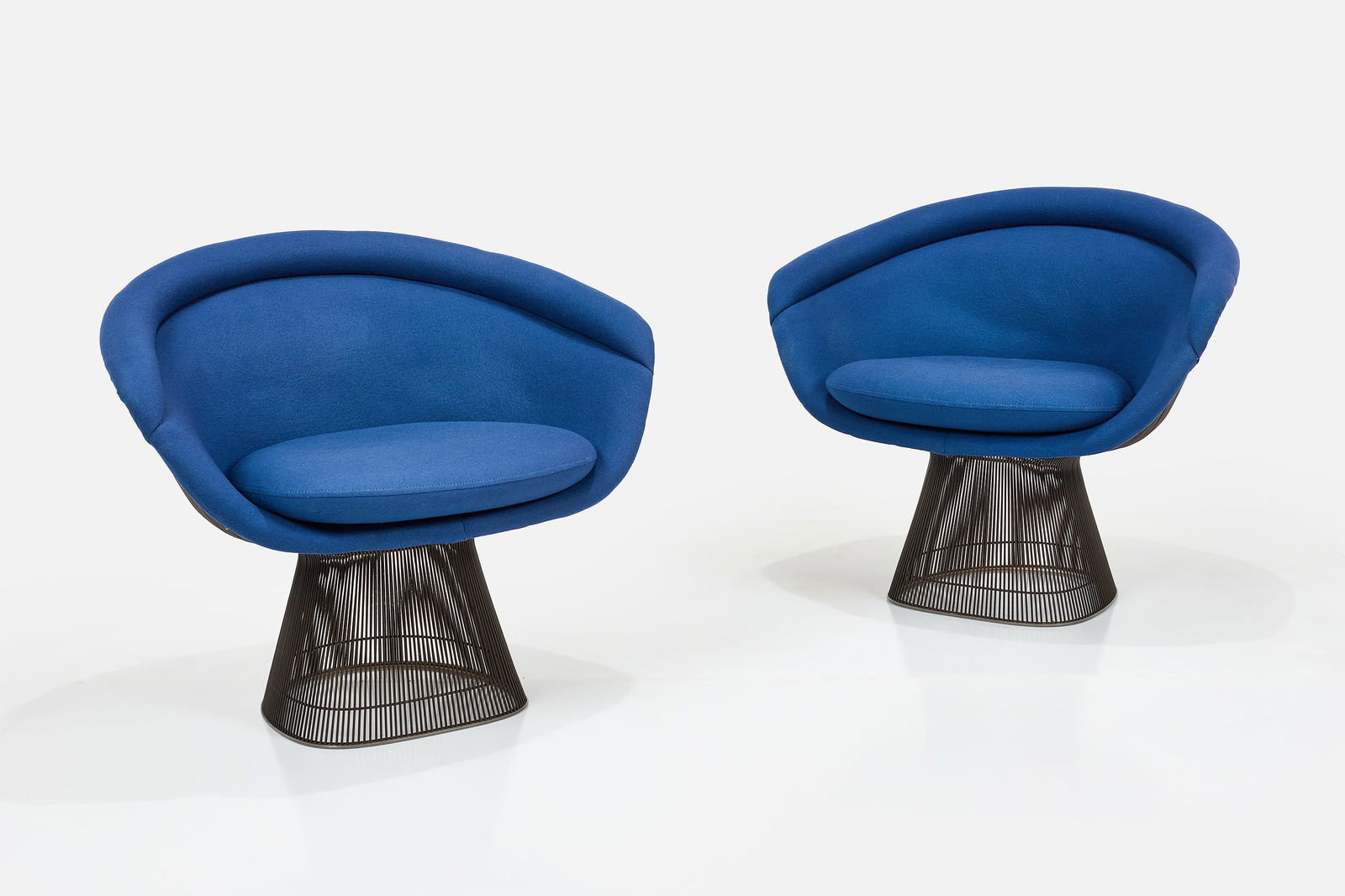Warren Platner, Lounge Chairs (2): WARREN PLATNER Pair of lounge chairs, model no. model 1715L, 1960s Patinated steel, wool, rubber. Manufactured by Knoll, USA. Each: 31" H x 36.5" W x 25" D Seat height: