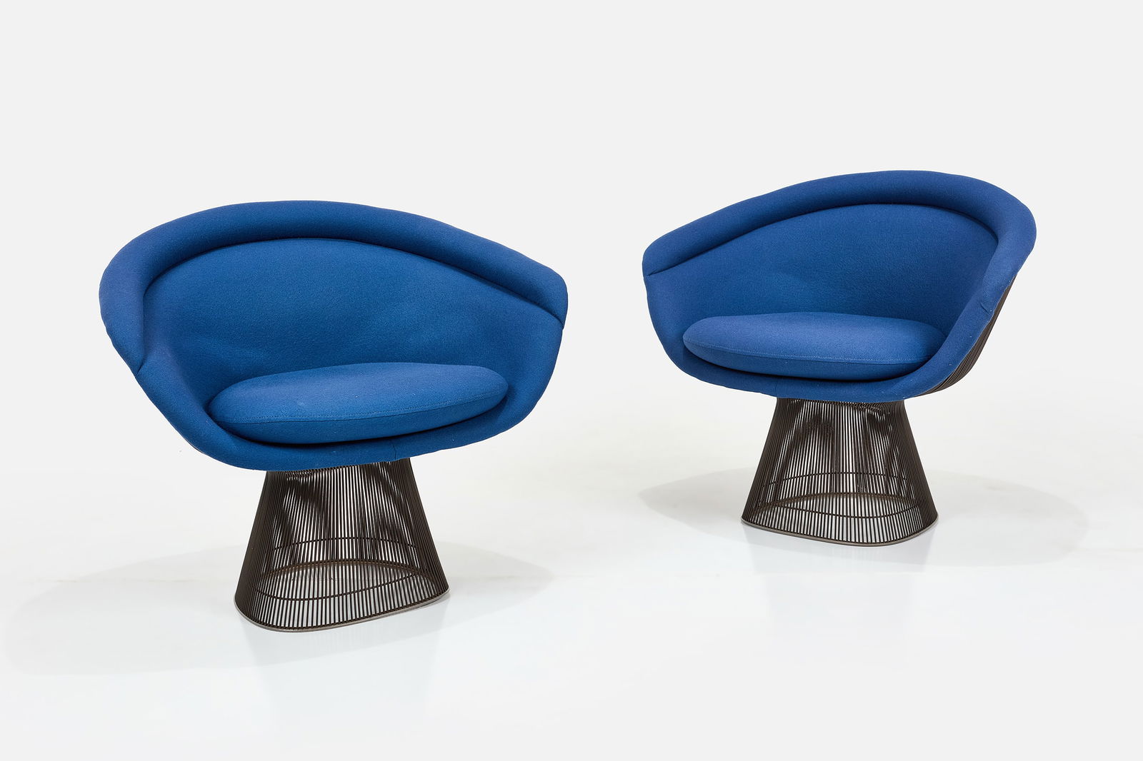 Warren Platner, Lounge Chairs (2): WARREN PLATNER Pair of lounge chairs, model no. model 1715L, 1960s Patinated steel, wool, rubber. Manufactured by Knoll, USA. Each: 31" H x 36.5" W x 25" D Seat height: