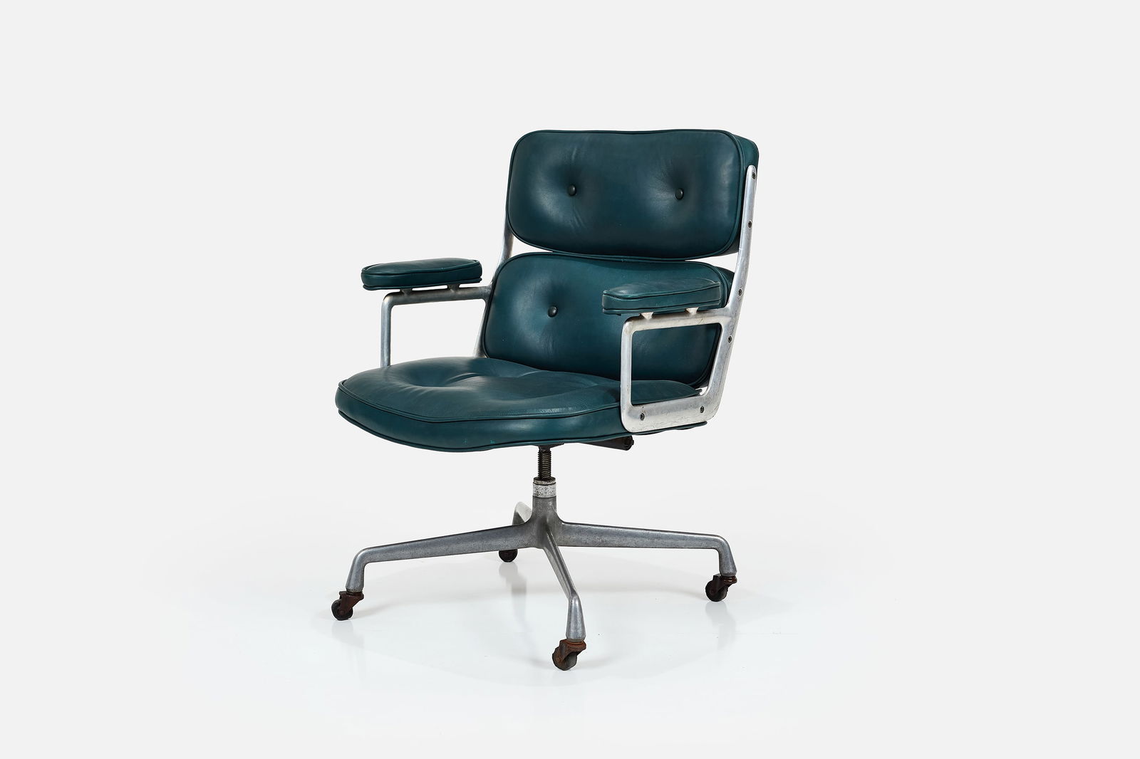 Charles + Ray Eames, 'Time Life' Desk Chair: CHARLES + RAY EAMES'Time Life' desk chair, 1966-1974Leather, cast aluminum, castors. Manufactured by Herman Miller, USA.Underside with manufacturer's white tag and plaque. 35&q