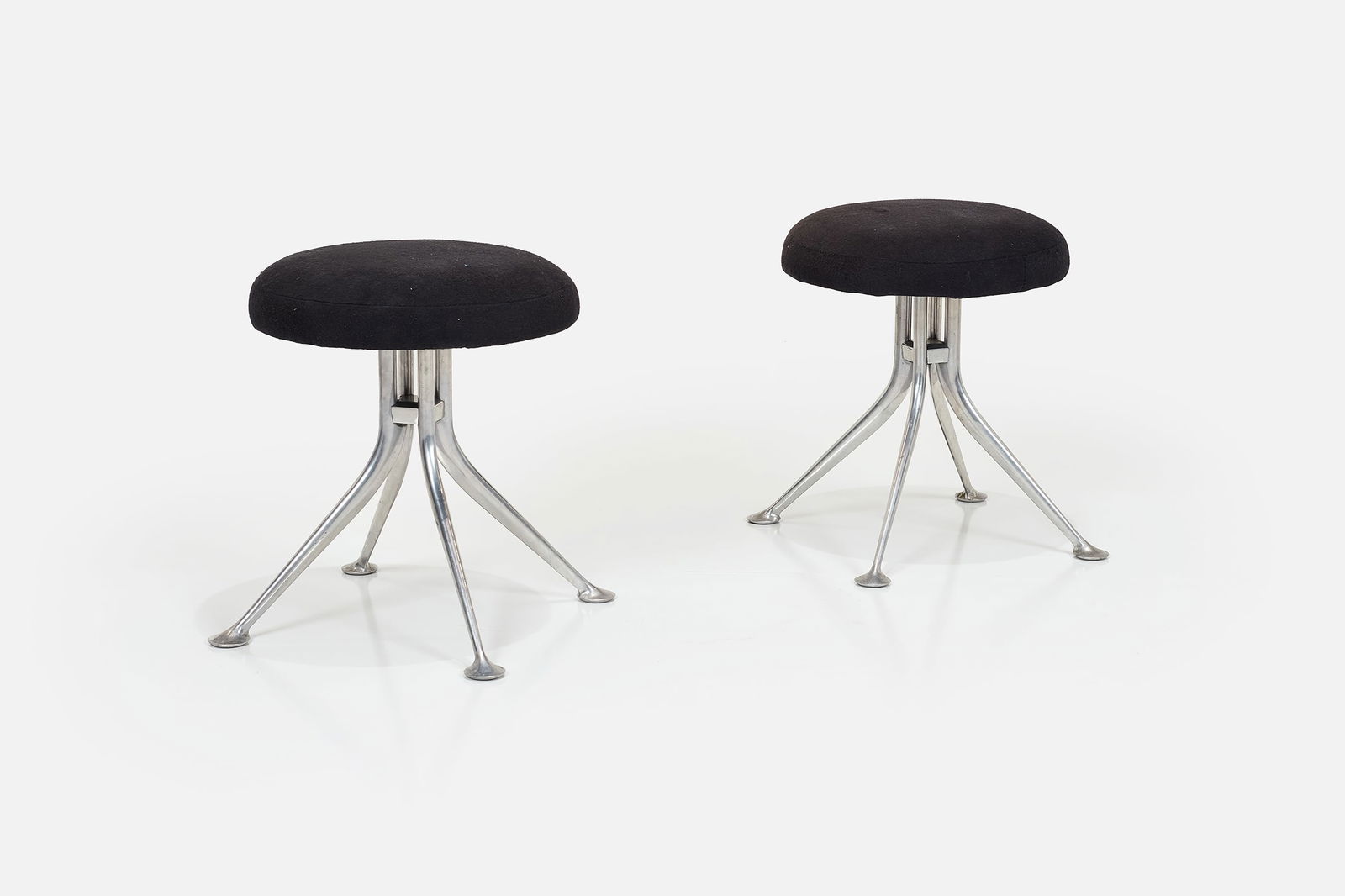 Alexander Girard, Stools (2): ALEXANDER GIRARD Pair of stools, model no. 66308, 1968 Cast aluminum, fabric. Manufactured by Herman Miller, USA. 18.25" H x 21" Diameter