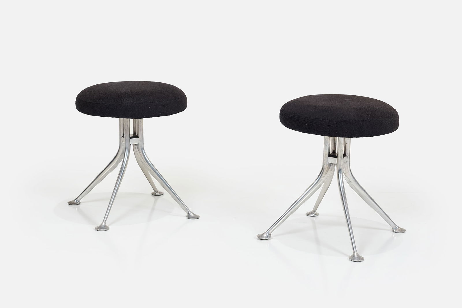 Alexander Girard, Stools (2): ALEXANDER GIRARD Pair of stools, model no. 66308, 1968 Cast aluminum, fabric. Manufactured by Herman Miller, USA. 18.25" H x 21" Diameter