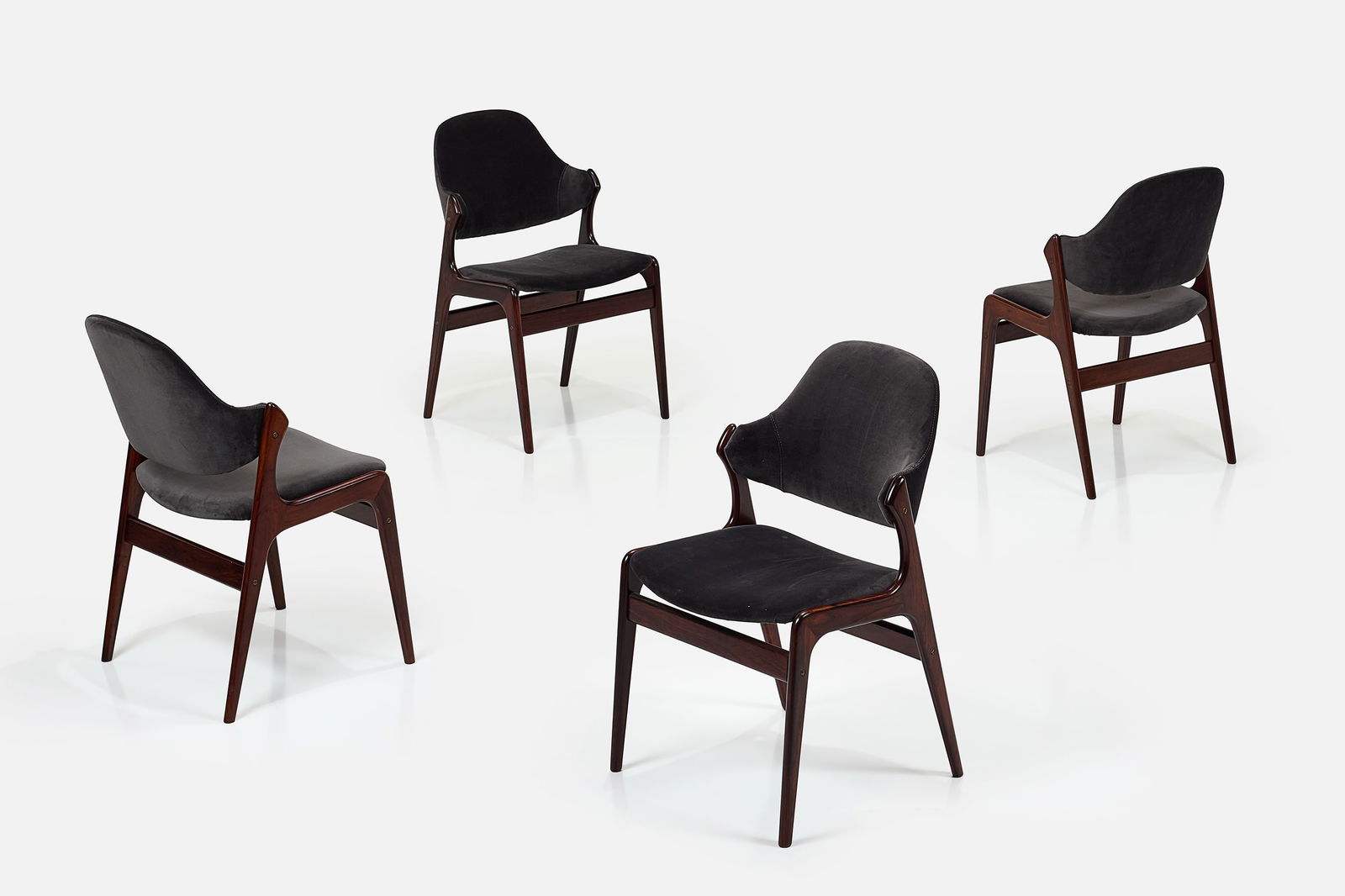 Ejvind A. Johansson, Chairs (4): EJVIND A. JOHANSSON Set of four chairs, 1960s Rosewood, velvet. Manufactured by Gern Mobelfabrik, Denmark. Each: 32" H x 19.5" W x 20" D Seat height: 18" 