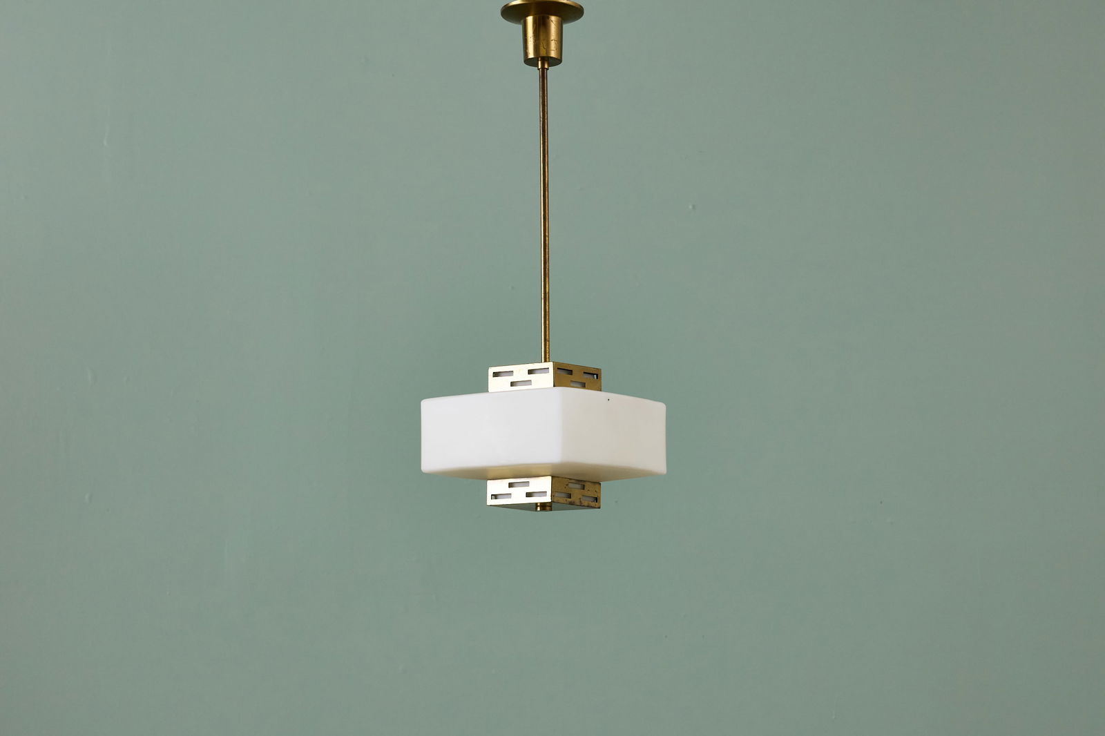 Elio Monesi, Pendant Lamp: ELIO MONESI Pendant lamp, 1950s Opaque glass, brass. Manufactured by Arredoluce, Italy. 33" H x 9" W x 9" D