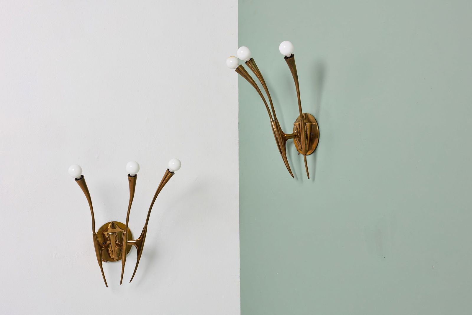 Oscar Torlaso, Three-Arm Sconces (2): OSCAR TORLASCOPair of three-arm sconces, model no. 395/A, 1960sBrass. Produced by Lumi, Italy. Each: 17" H x 12" W x 8" D