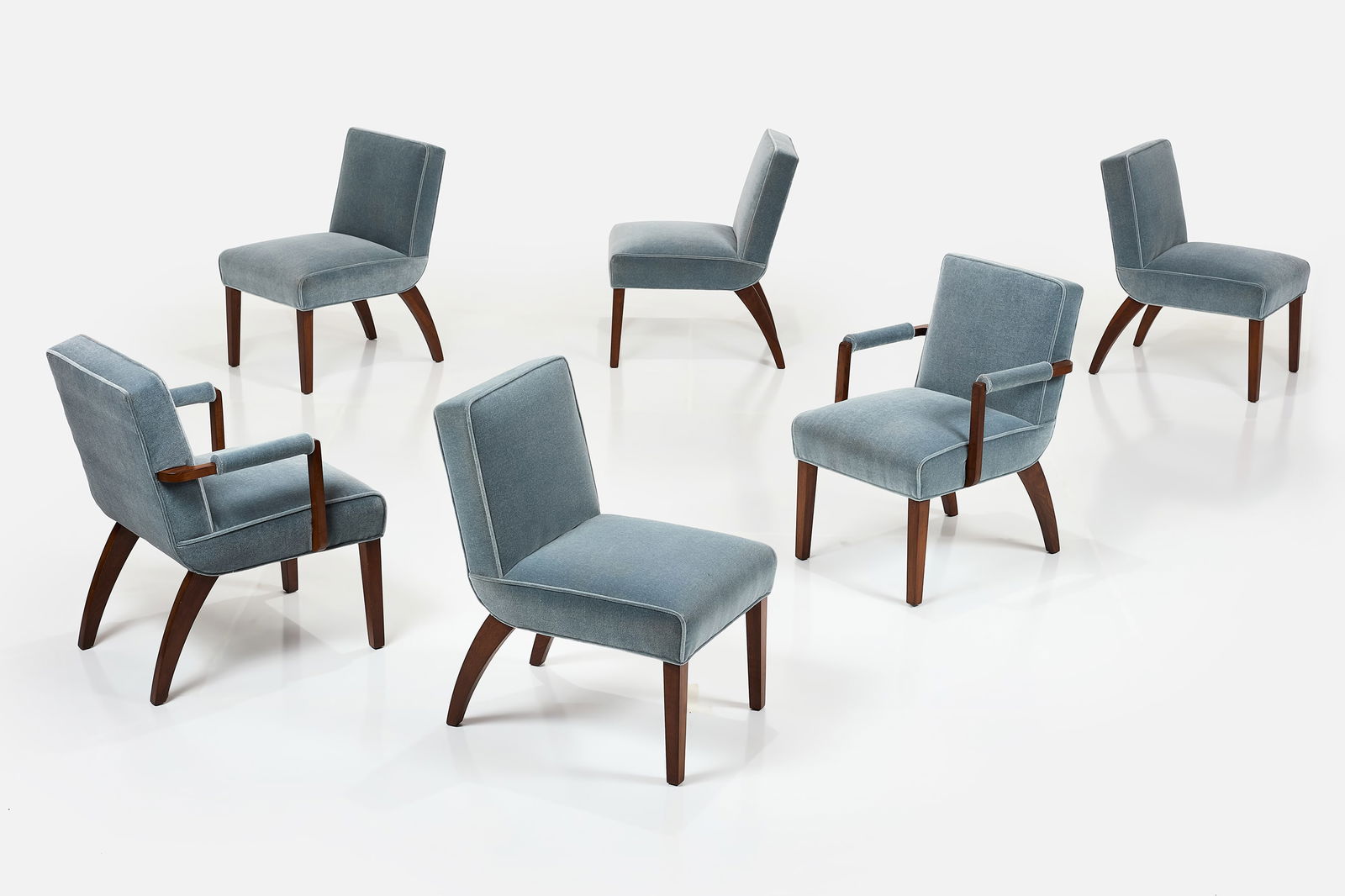 Gilbert Rohde, Dining Chairs (6): GILBERT ROHDESet of six dining chairs, 1940sStained wood, velvet. Manufactured by Herman Miller, USA. Each armchair: 33" H x 22.5" W x 26" DSeat height: 18" Arm height: