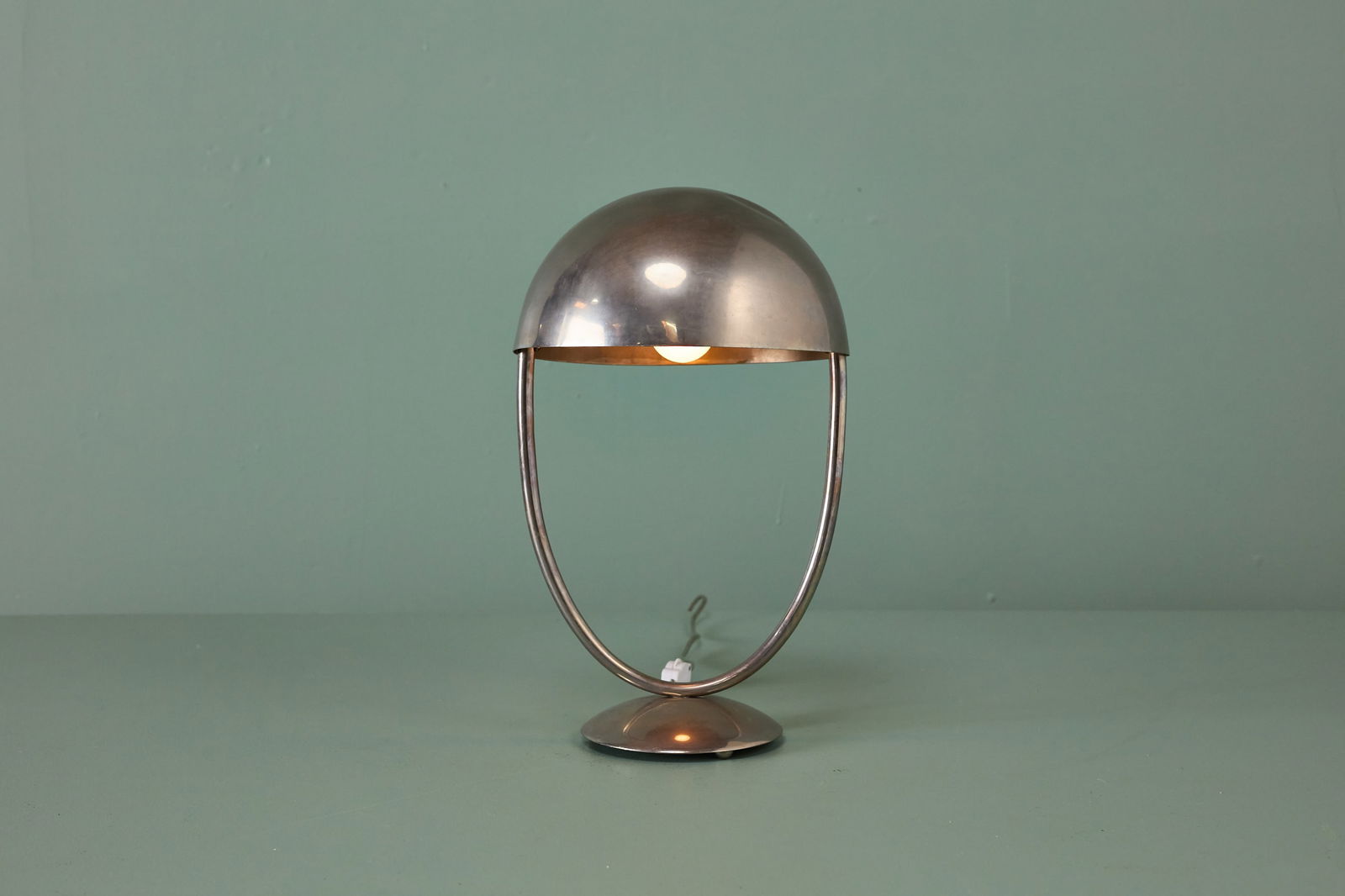 Clement Naudy, Table Lamp: CLEMENT NAUDY Table lamp, 1940s Nickel-plated metal. Produced by Maison Desny, France. Underside impressed "DESNY PARIS / MADE IN FRANCE / DEPOSE". 16.5" H x 10"