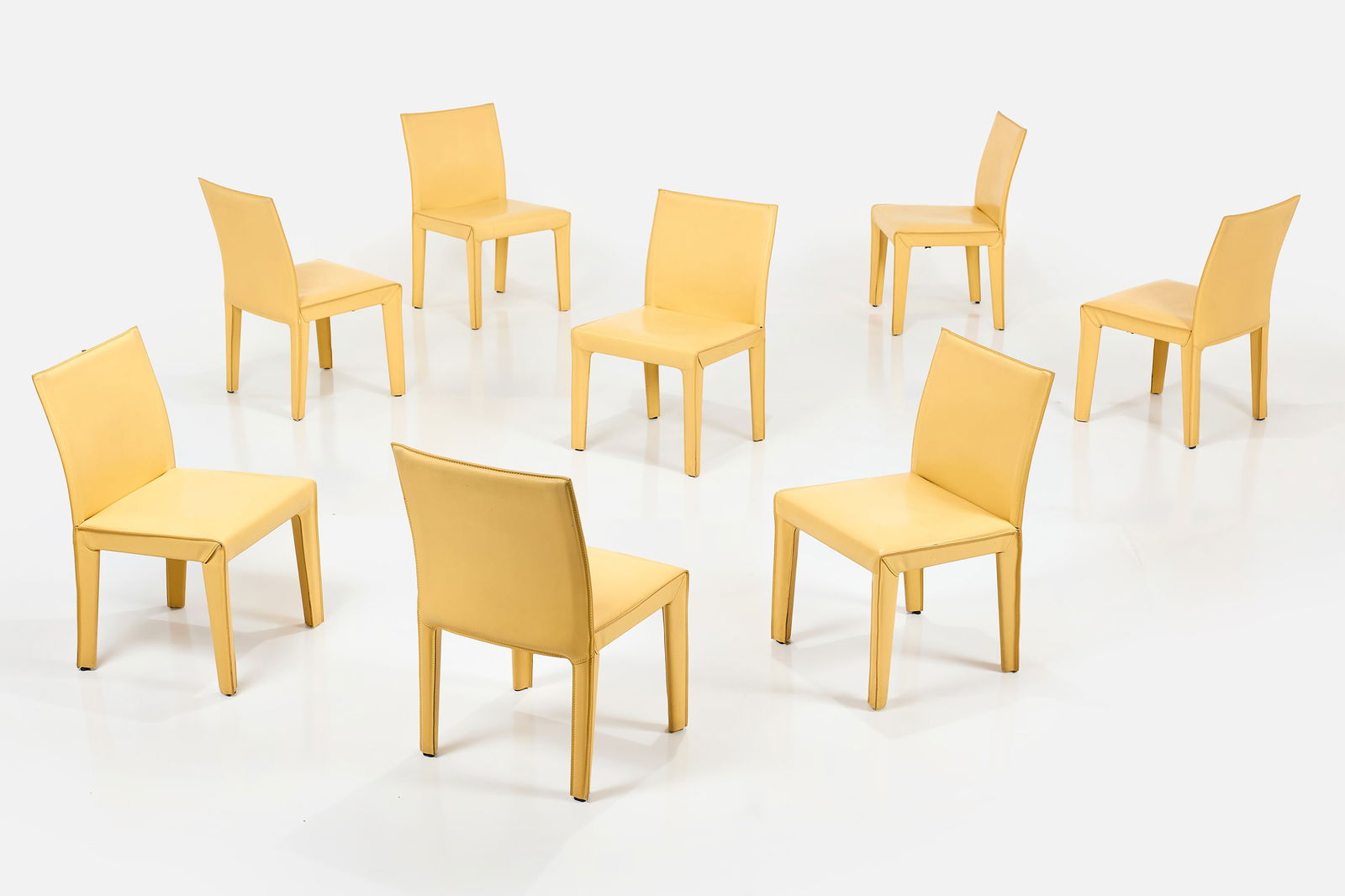 Arper, Dining Chairs (8): ARPER Set of eight dining chairs, 1990s Leather over steel. Manufactured by Arper, Italy. Underside stamped with manufacturer's mark. Each: 32.25" H x 20" W x 19" D Seat