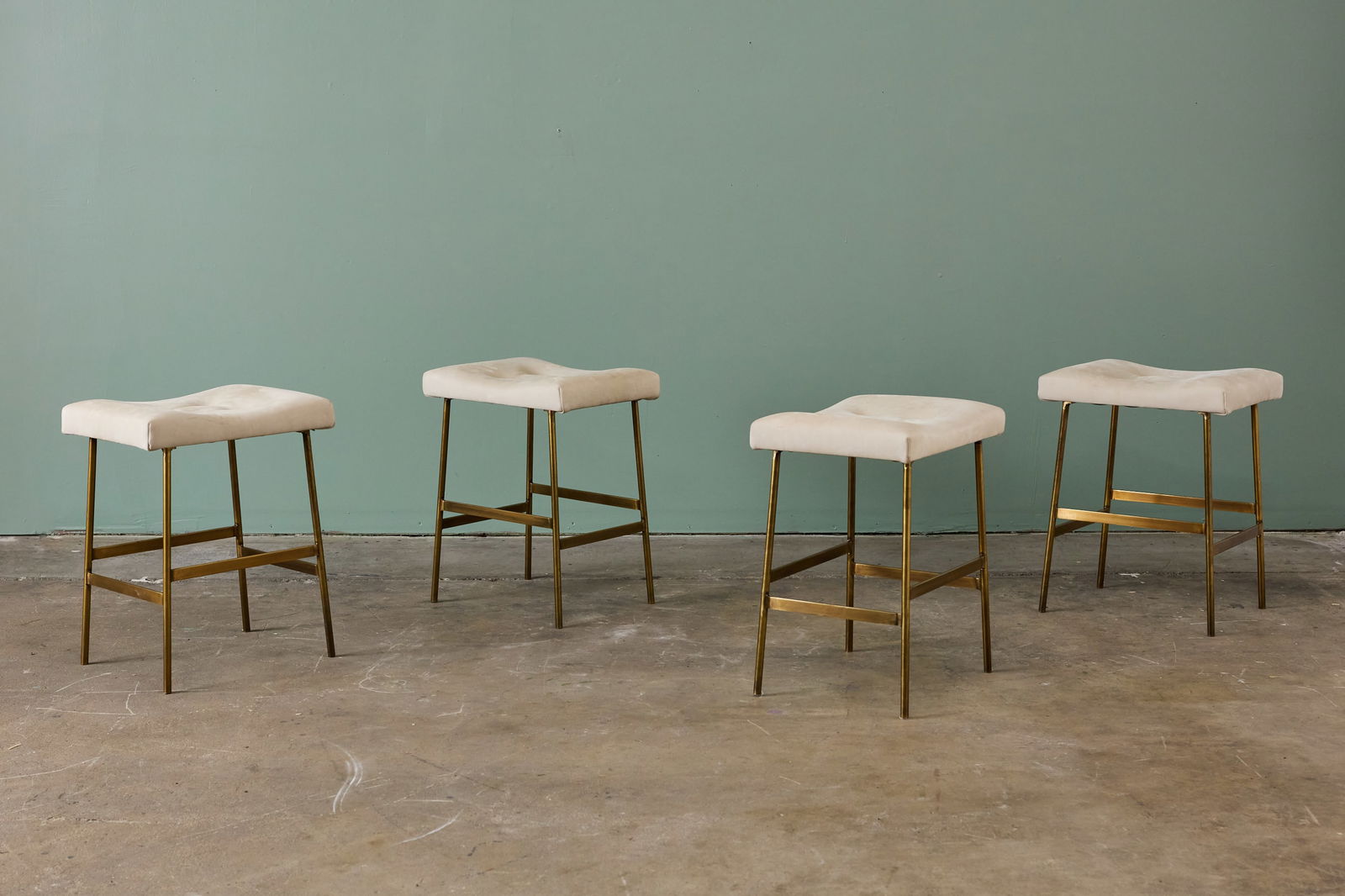 Thomas Hayes, 'Petit Bunda' Stools (4): THOMAS HAYES Set of four 'Petit Bunda' stools, 2010s Brass, leather. Produced by Thomas Hayes Studio, USA. Each: 22" H x 18" W x 14" D