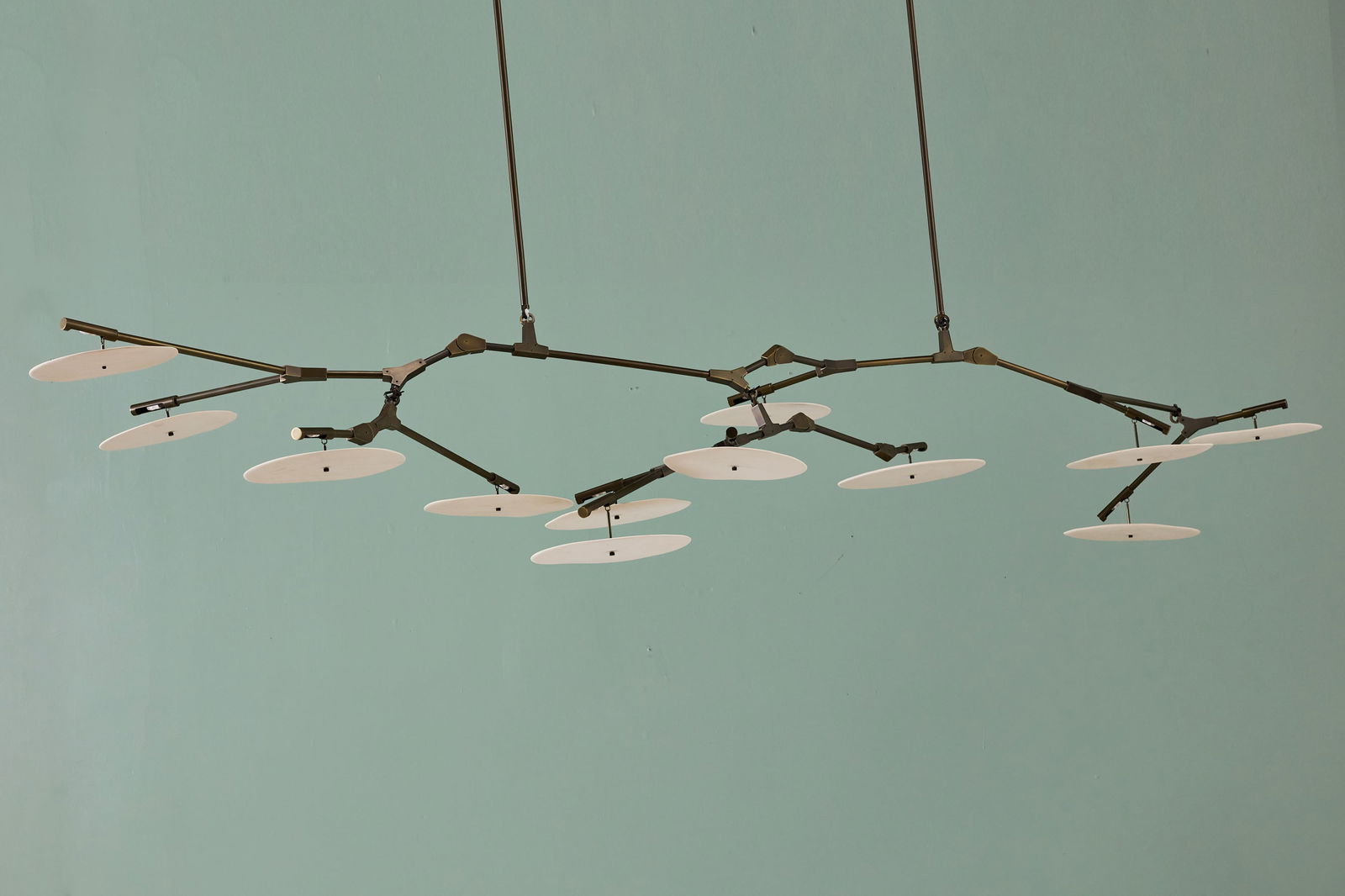 Lindsey Adelman, 12-Light 'Branching Disc' Chandelier: LINDSEY ADELMANTwelve-light 'Branching Disc' chandelier, model no. BD.12.01, 2015Patinated steel, porcelain. Produced by Lindsey Adelman Studio, USA.Canopy with producer's label. 24