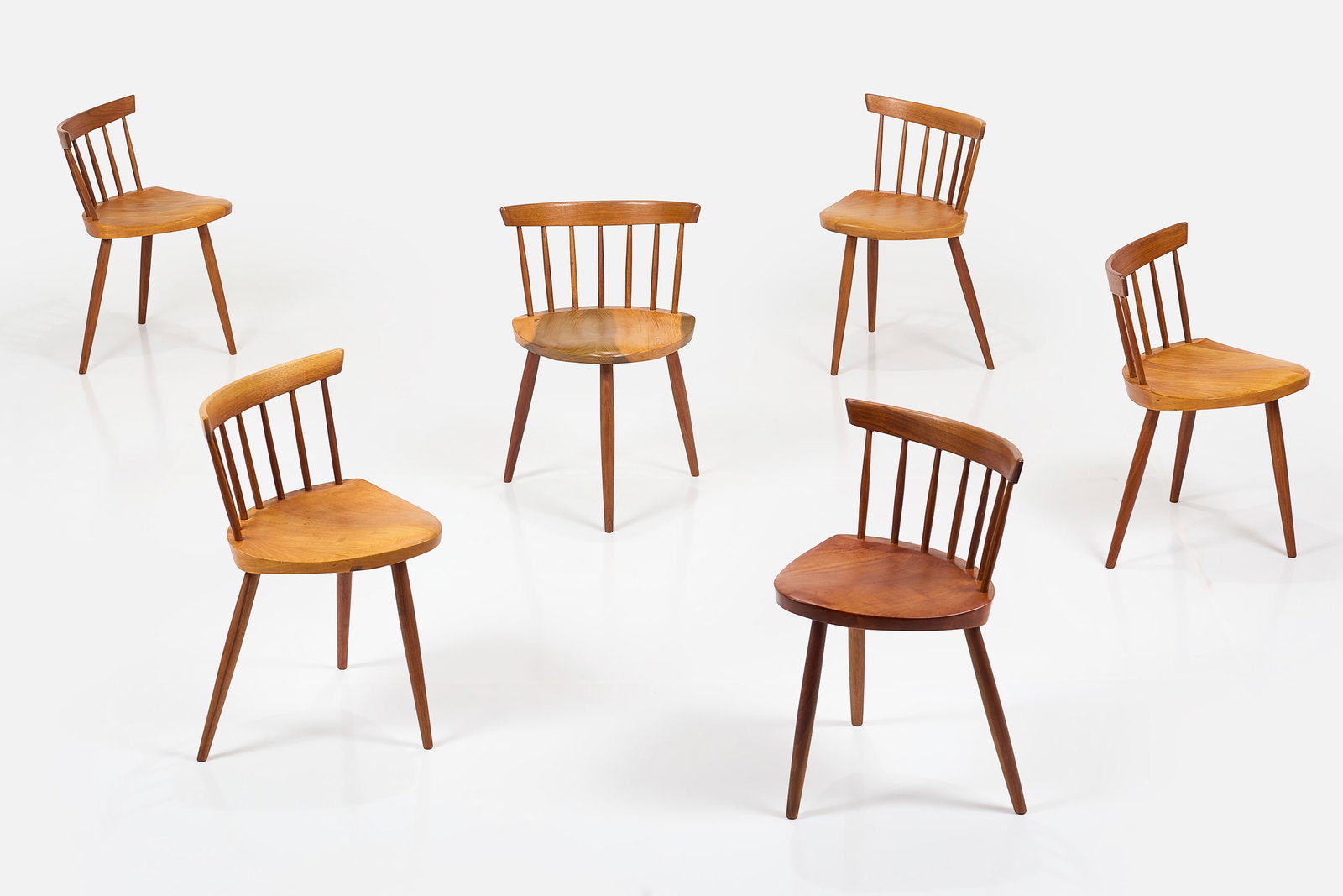 George Nakashima, 'Mira' Chairs (6): GEORGE NAKASHIMA Set of six 'Mira' chairs Cherr, hickory. Produced by Nakashima Studios, USA. Each: 27" H x 19.5" W x 16.5" D Seat height: 17.5"