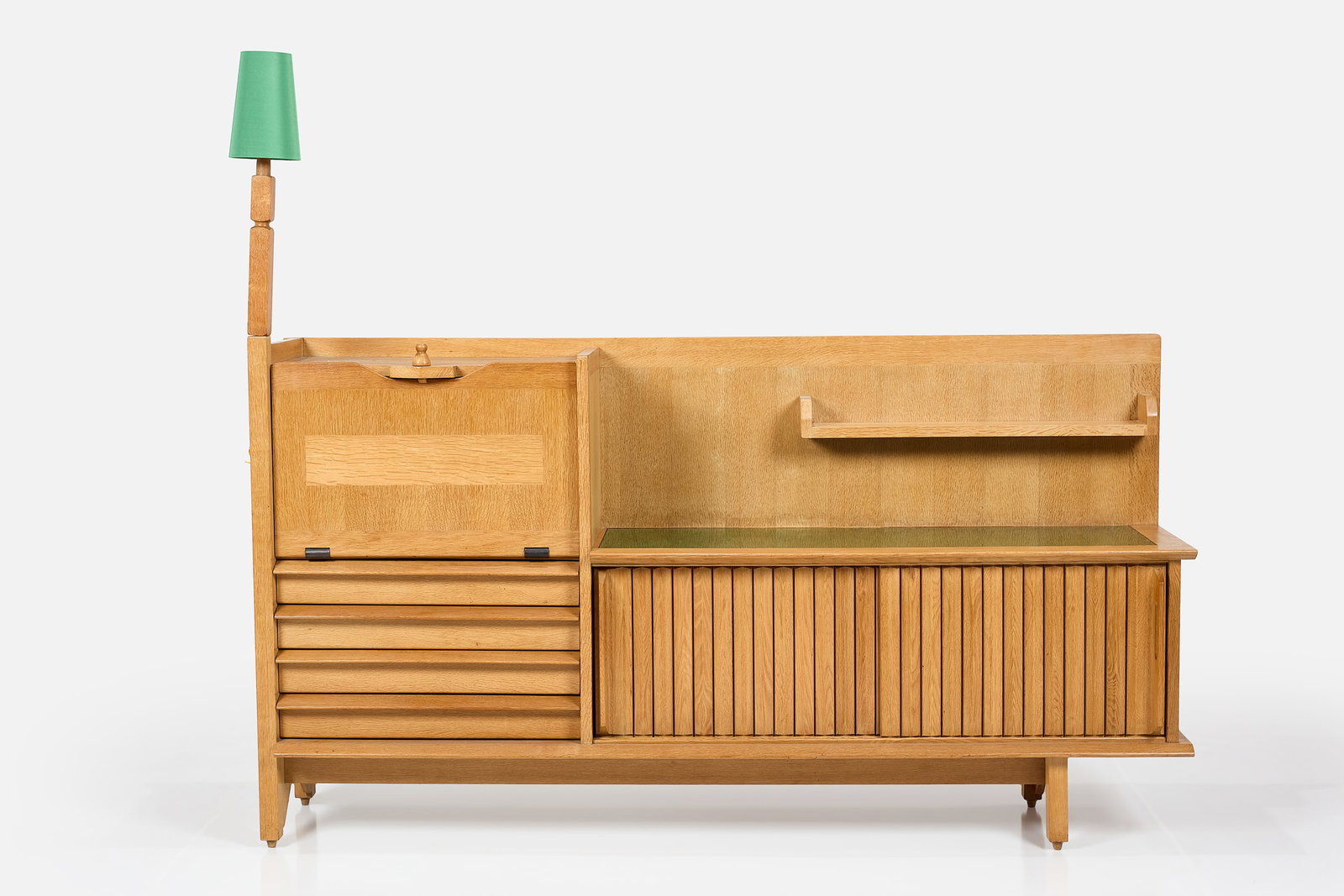 Robert Guillerme + Jacques Chambron, Sideboard: ROBERT GUILLERME + JACQUES CHAMBRON Sideboard with bar cabinet, ca. 1960 Oak, reverse-painted glass, leather. Produced in France. 69" H x 89" W x 19.75" D 