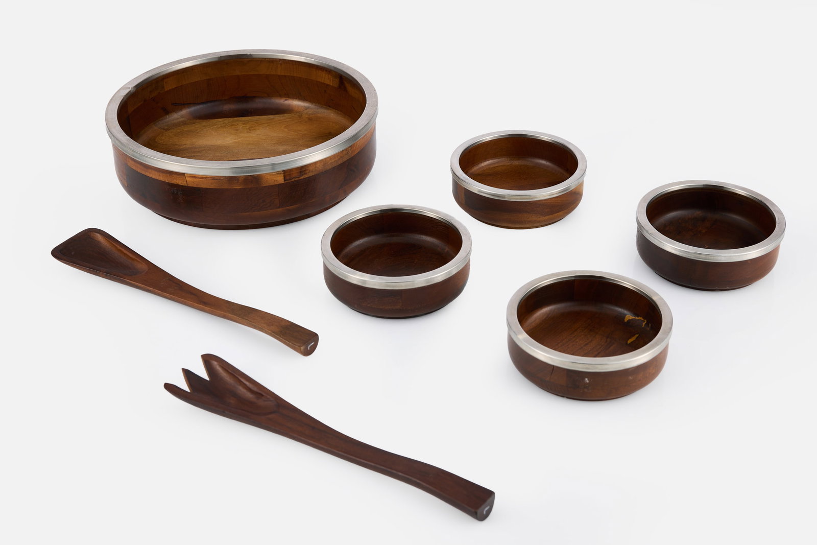 Jean Dobre, Serving Set (7): JEAN DOBRE Serving set, 1960s Imbuia, metal. Produced by Tropic-art, Brazil. Small bowls: 2" H x 6" Diameter Large bowl: 3.5" H x 12" Diameter 