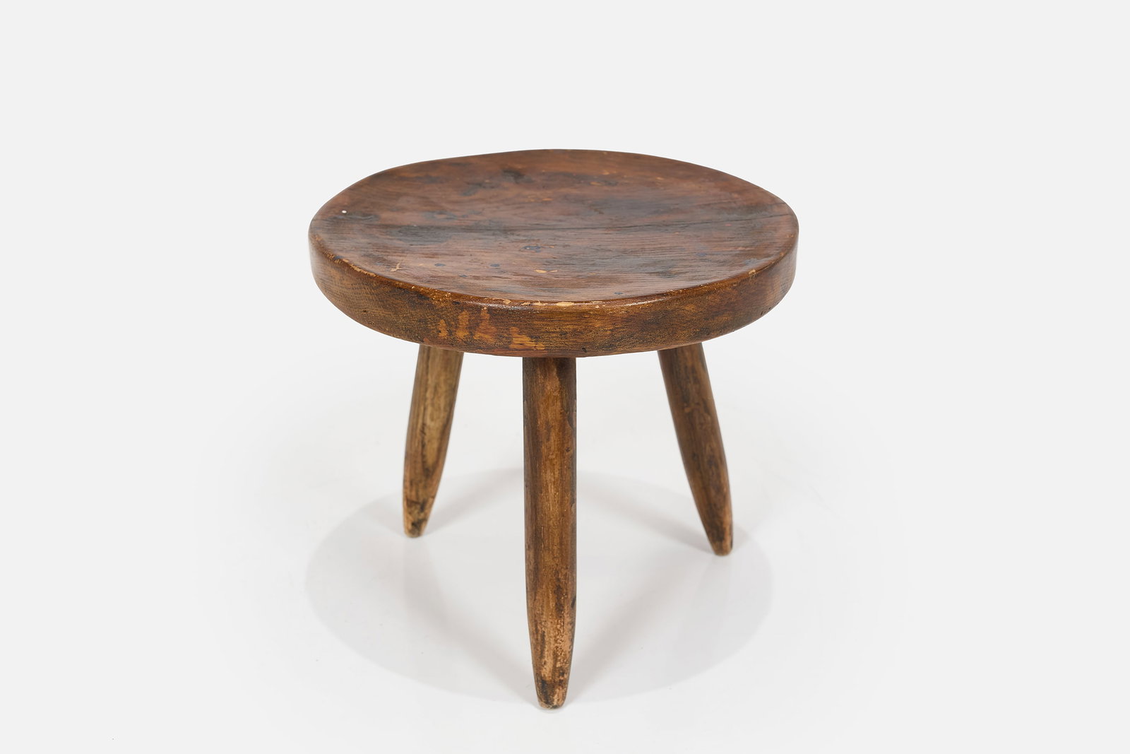 Charlotte Perriand Style, Milking Stool: CHARLOTTE PERRIAND STYLE Milking stool, 1950s Wood. Produced in France. 11" H x 12" Diameter 