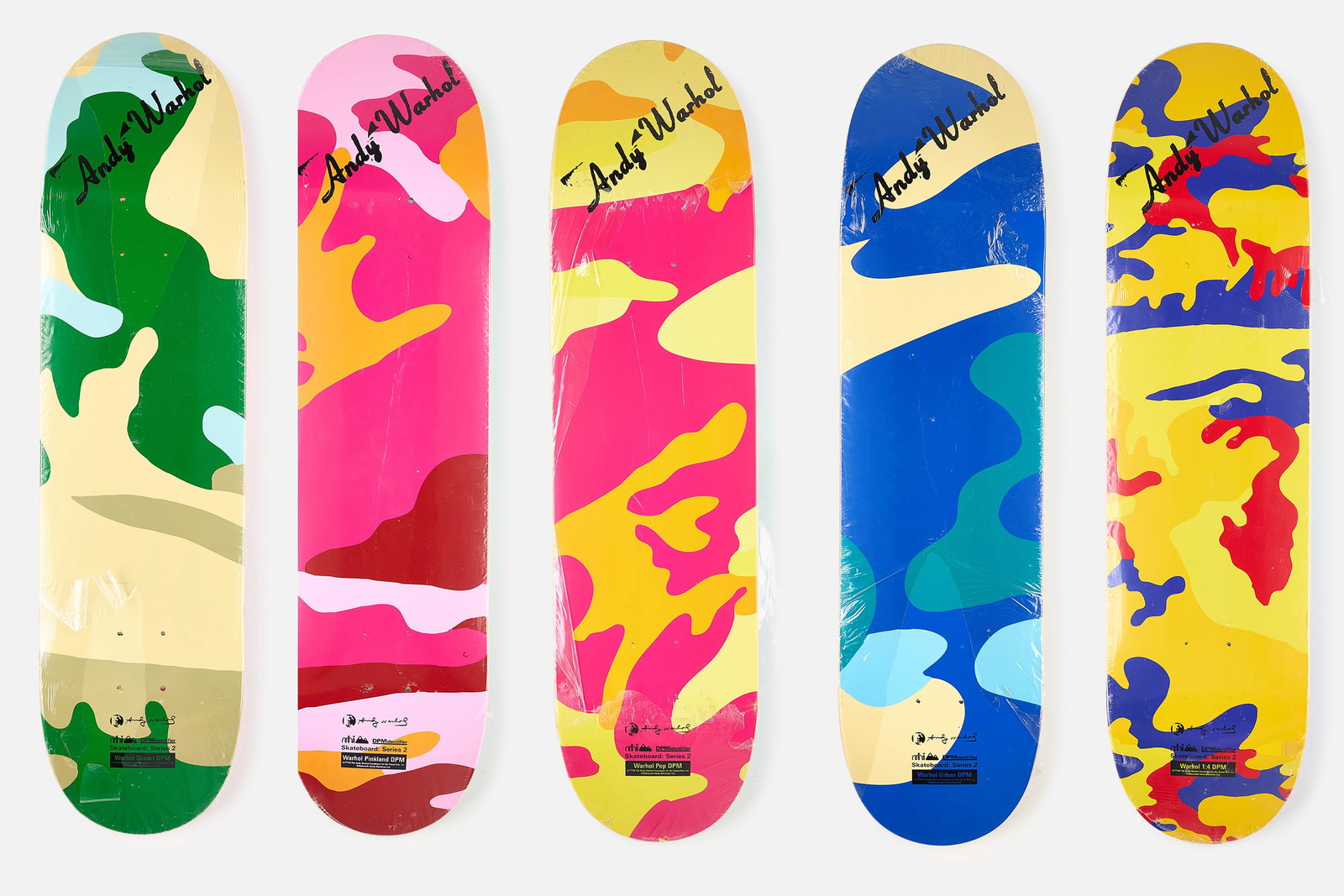 Andy Warhol, 'Camouflage' Skate Decks (5): ANDY WARHOL Set of five 'Camouflage' skate decks, 2007 Offset lithographs in colors on skate decks. Produced by Maharishi, in collaboration with the Andy Warhol Foundation. Printed with