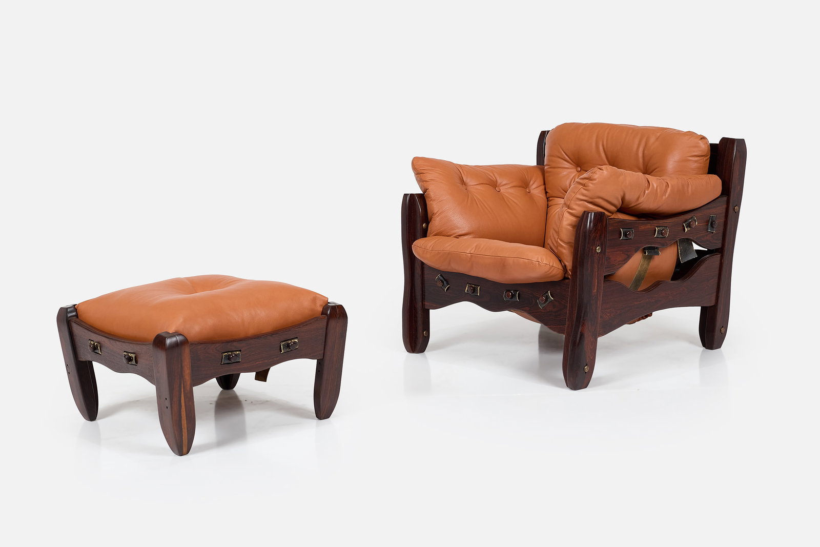 Don Shoemaker, 'Descanso' Lounge Chair + Ottoman (2): DON SHOEMAKER Rare 'Descanso' lounge chair and ottoman, 1970s Cocobolo, leather. Made in Mexico. Chair: 33" H x 36.5" W x 31.5" D Seat height: 17" Ottoman: 15"