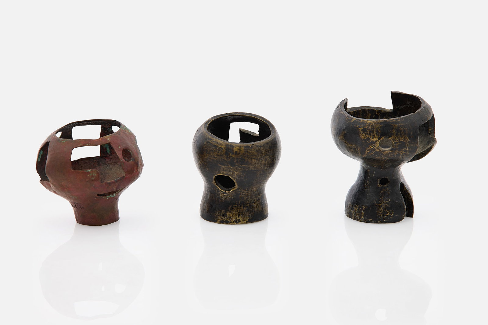 Mathias Goeritz, Sculptures (3): MATHIAS GOERITZ Group of three sculptures, 1960s Cast bronze, hammered copper. Made in Mexico. Copper sculpture signed "MG" and stamped "TNBA". Large bronze sculpture signed