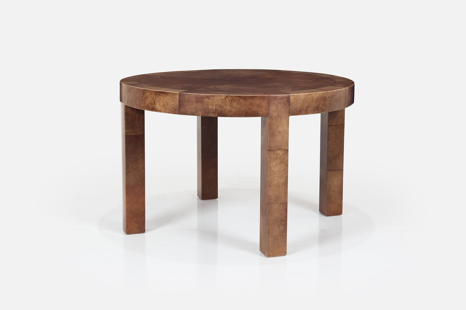 Aldo Tura, Dining Table: ALDO TURA Round dining table, 1970s Lacquered goatskin, painted wood. Made in Italy. 30" H x 47.25" Diameter 