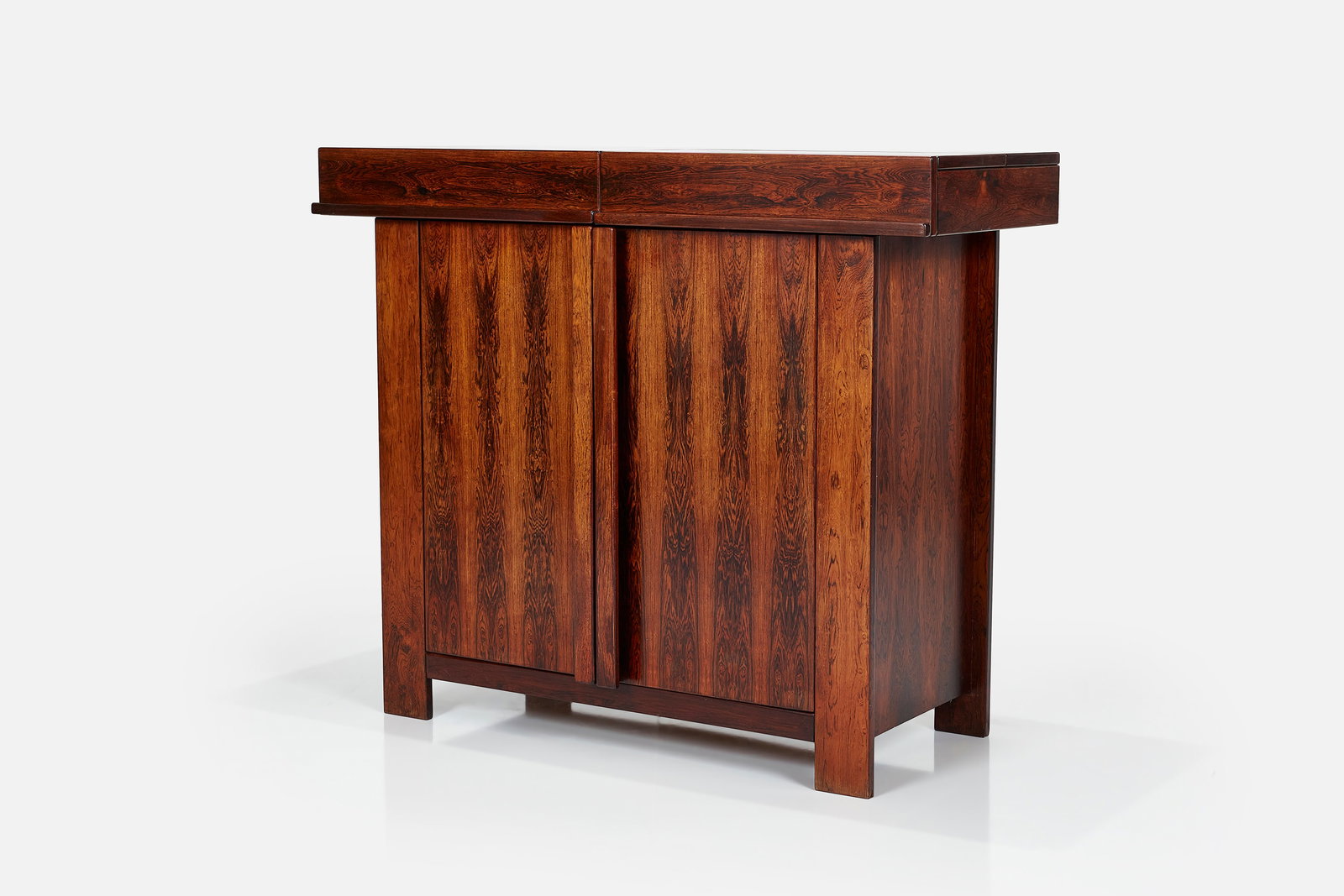 Sergio + Georgio Saporiti, Dressing Cabinet: SERGIO + GEORGIO SAPORITI Dressing cabinet, 1960s Rosewood-veneered wood, rosewood. Manufactured by Saporiti, Italy. 48.25" H x 57" W x 23.25" D