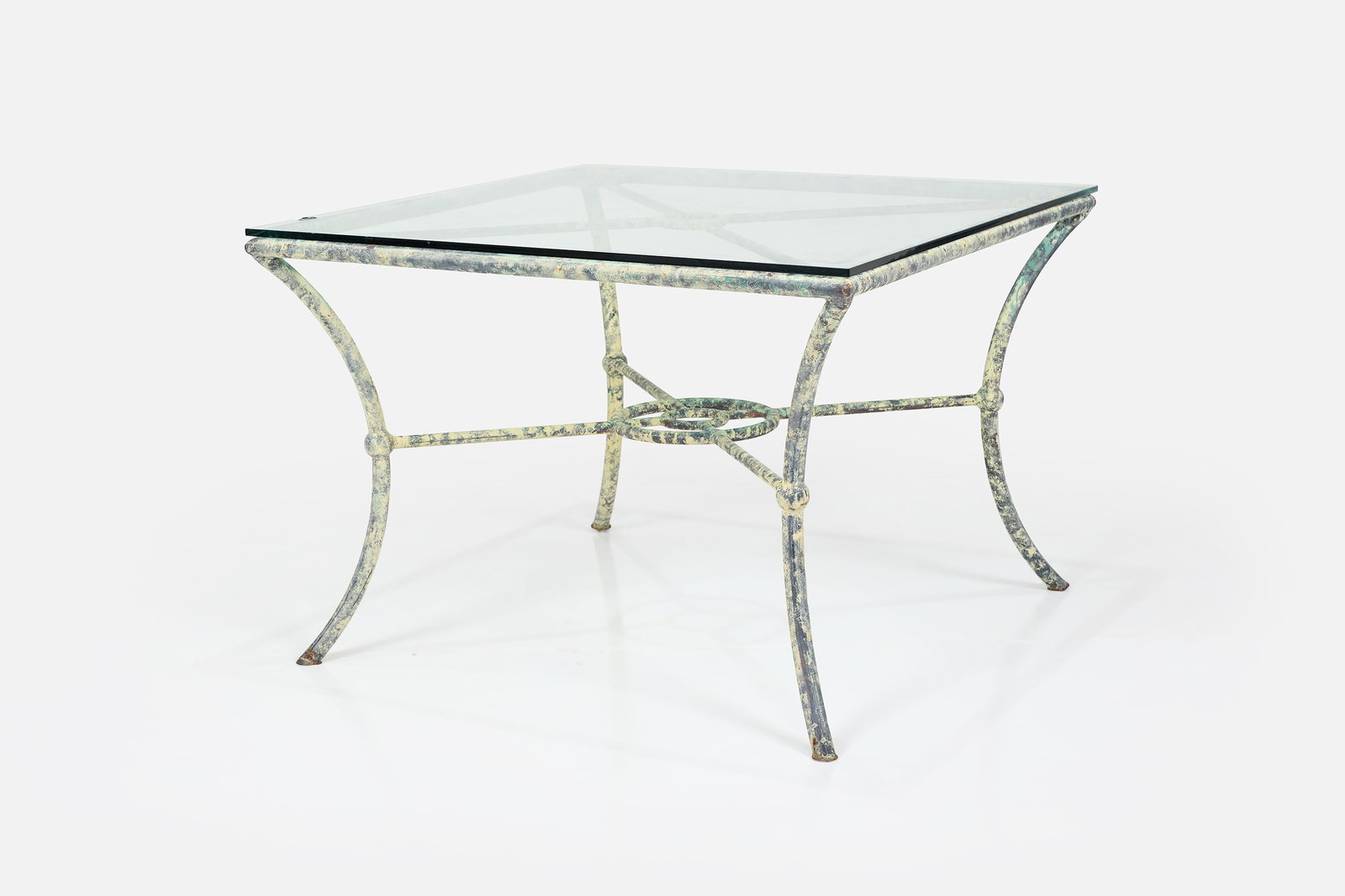 Diego Giacometti Style, Dining Table: DIEGO GIACOMETTI STYLE Dining table, 1970s Patinated metal, glass. 29" H x 42" W x 42" D 