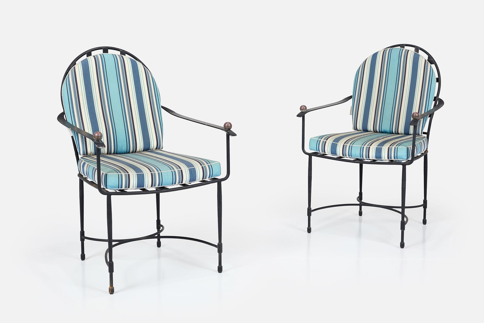 Mario Papperzini, 'Amalfi' Armchairs (2): AFTER MARIO PAPPERZINI Pair of 'Amalfi' armchairs, ca. 2010 Powder-coated aluminum, iron, fabric. Manufactured by Janus et Cie, USA. Cushions with manufacturer's seam tag. Each: 36&