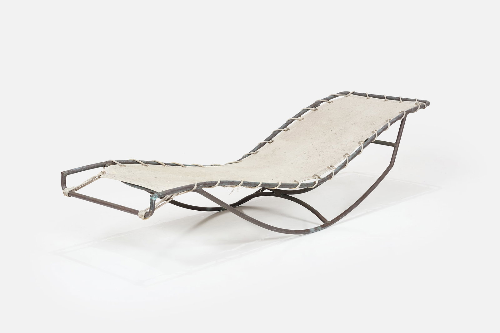 Walter Lamb, 'Waikiki' Rocking Chaise Lounge: WALTER LAMB 'Waikiki' rocking chaise lounge, 1960s Bronze, canvas, yacht cord. Produced by Brown Jordan, USA. 18" H x 21" W x 69" D 