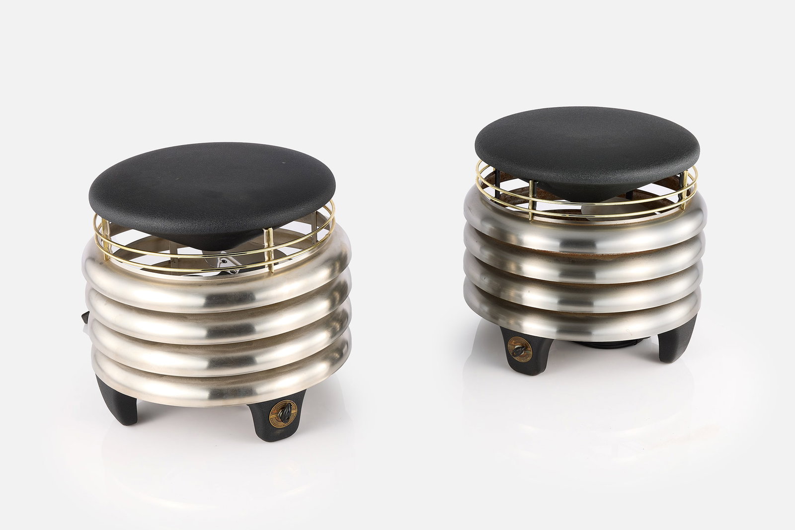 J. W. Kisling, 'Regal-Aire Junior' Hassock Fans (2): J. W. KISLING Pair of 'Regal-Aire Junior' hassock fans, 1950s Steel, aluminum. Produced by Kisco Co., St Louis, MO. Each: 14" H x 14" Diameter