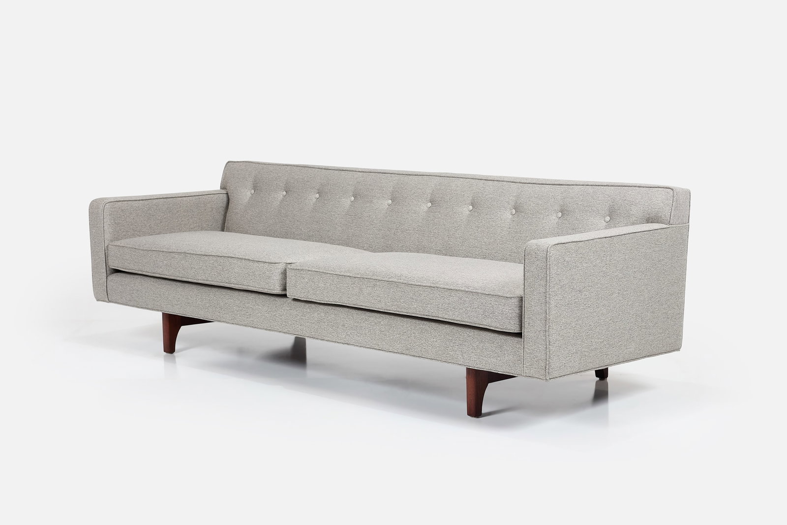 Edward Wormley, Bracket-Back Sofa: EDWARD WORMLEY Bracket-back sofa, 1950s Fabric, mahogany. Manufactured by Dunbar, USA. 28.5" H x 91" W x 31" D Seat height: 17.5" 