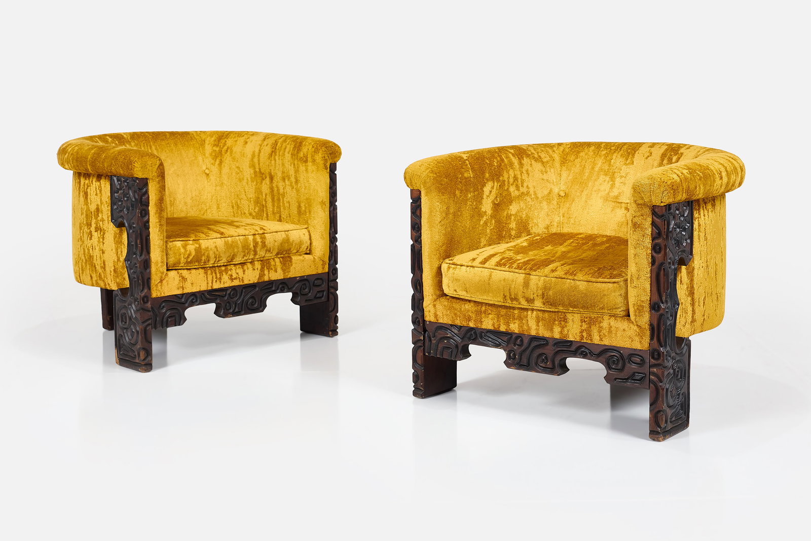 Witco, Lounge Chairs (2): WITCO Pair of lounge chairs, 1970s Carved redwood, crushed velvet. Manufactured by Witco, USA. Each: 27" H x 32" W x 28" D Seat height: 16" 